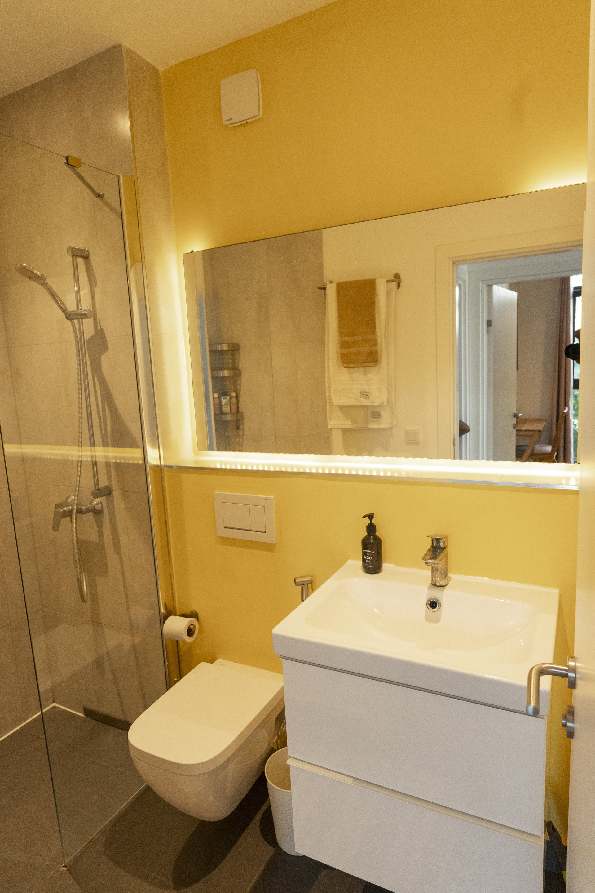 Bathroom with shower and vanity