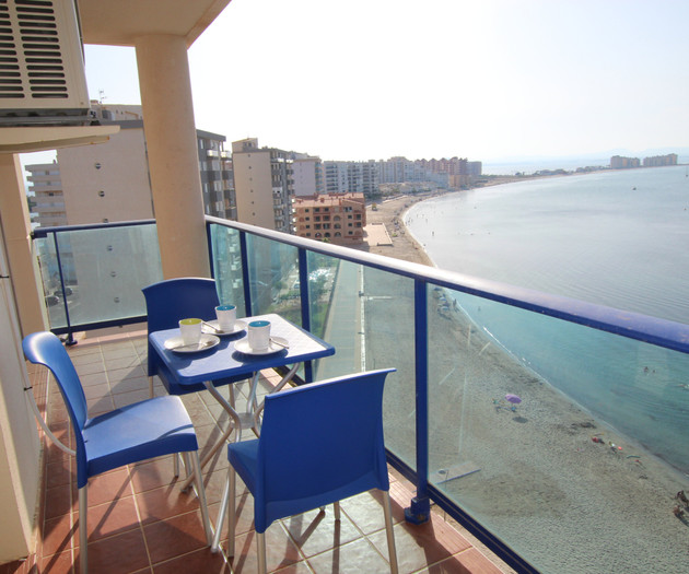 Balcony seating with beach view