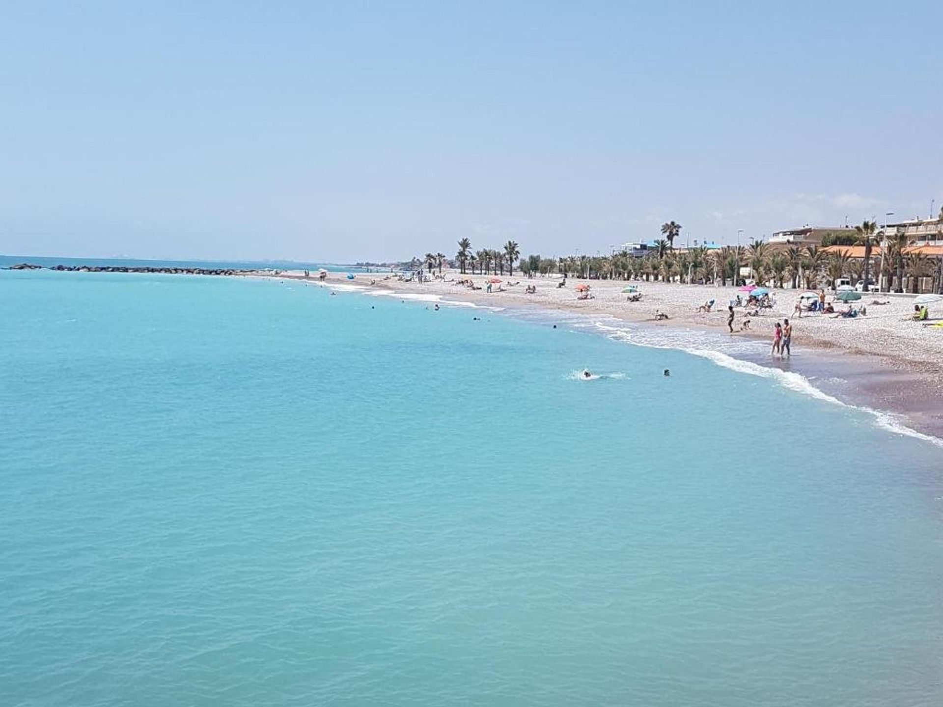 Sunny beach with turquoise water