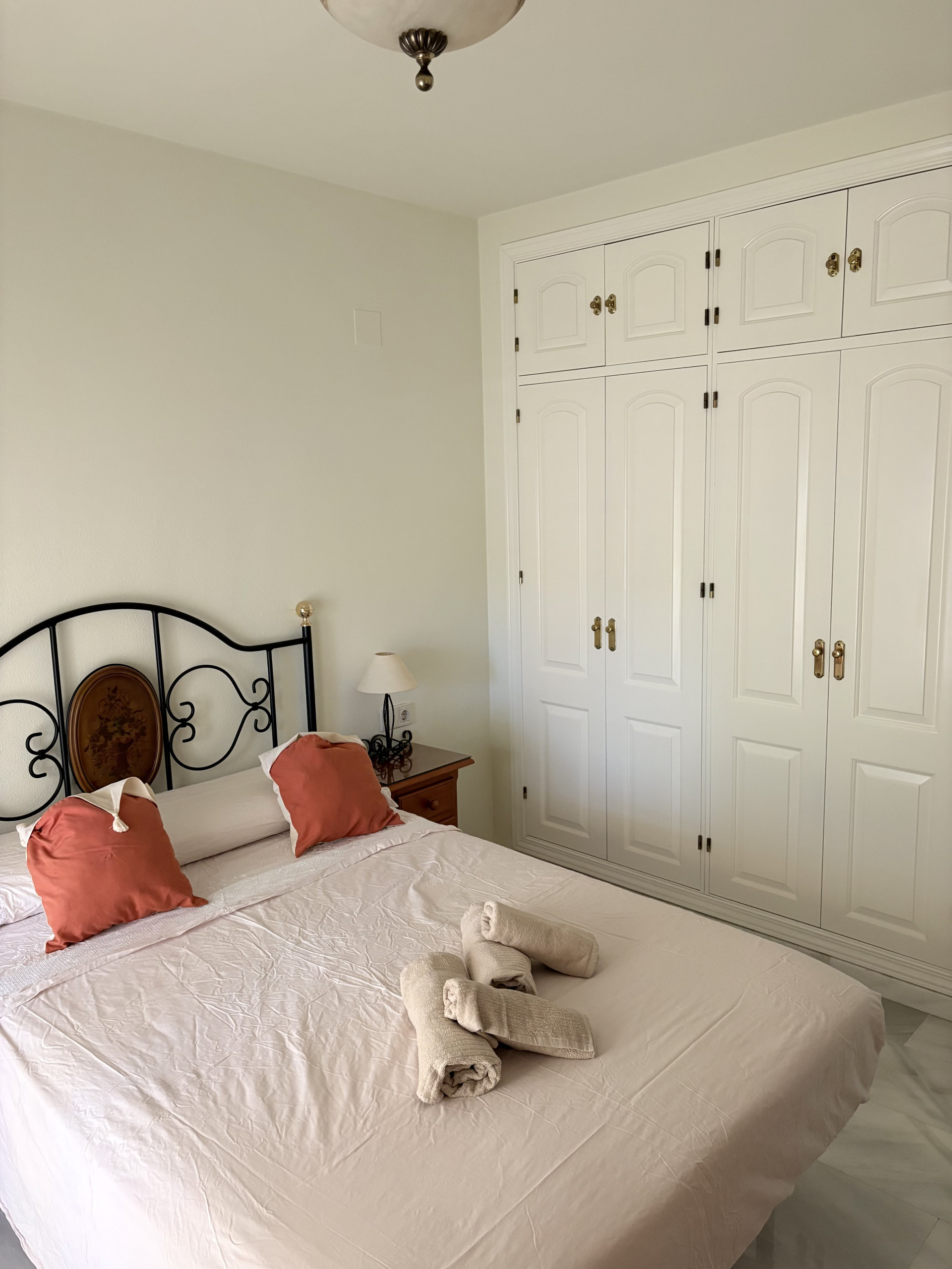 Bedroom with wardrobe and bed