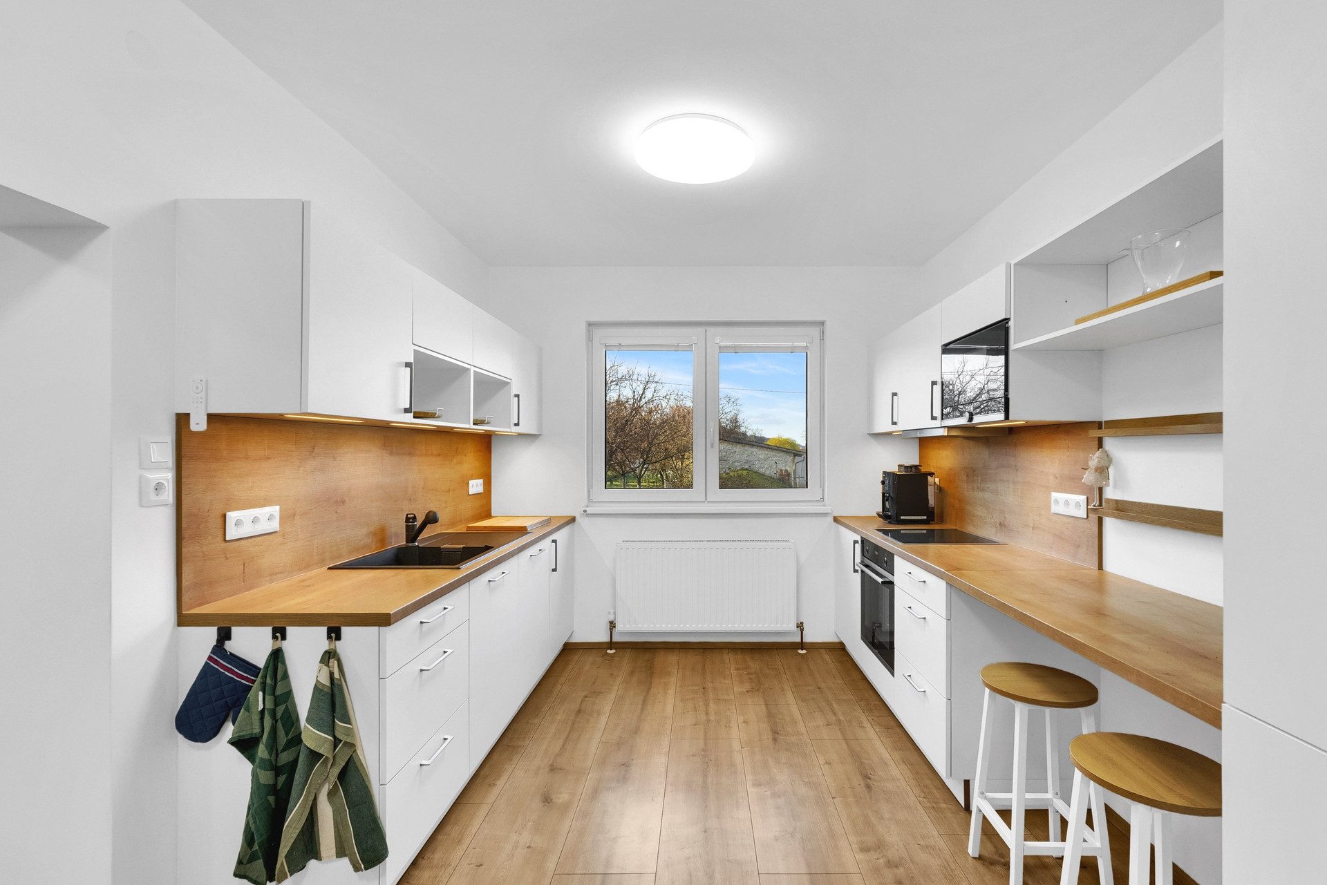 Modern white kitchen wood countertops