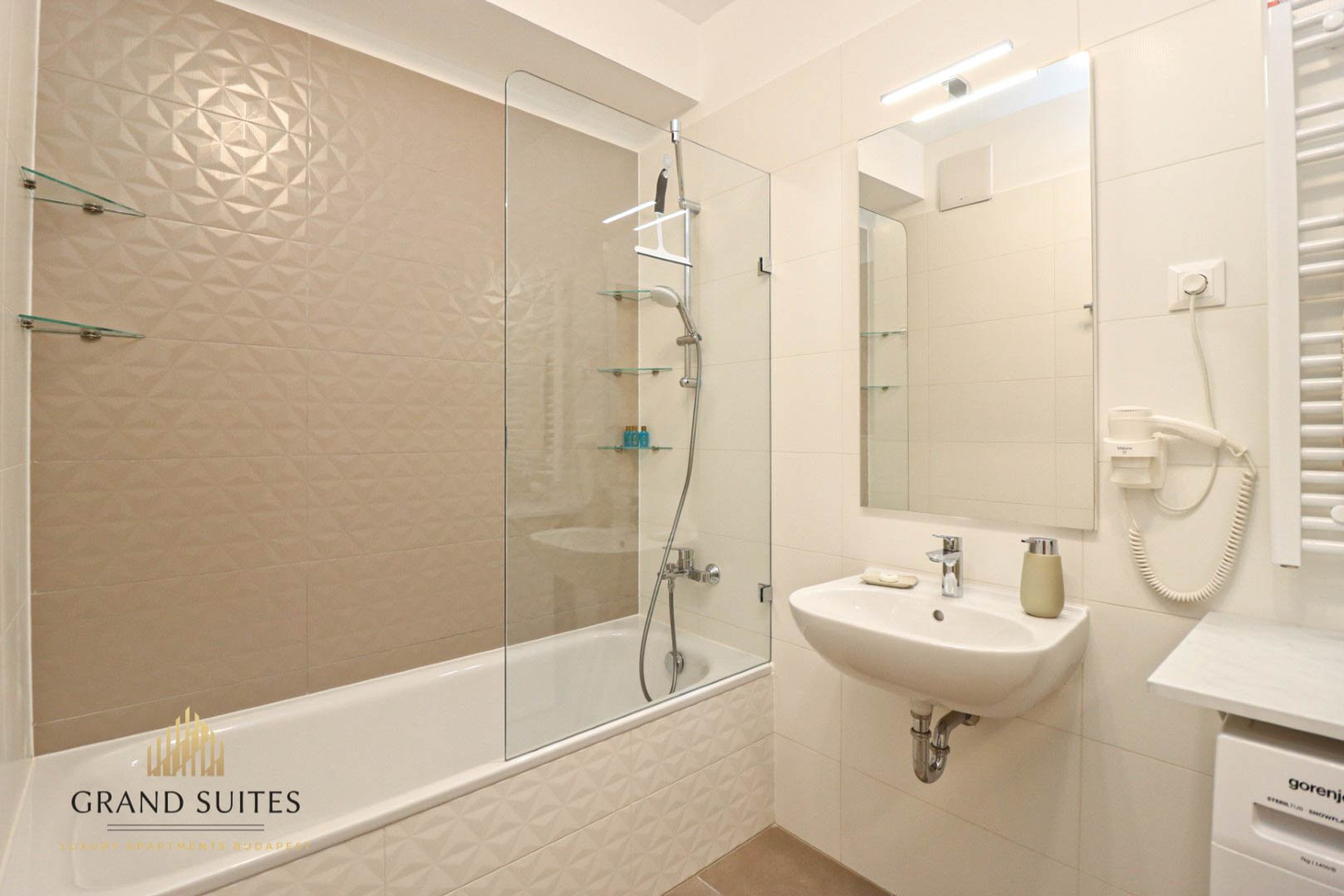 Bathroom with bathtub and shower