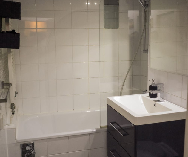 Bathroom with tub and sink