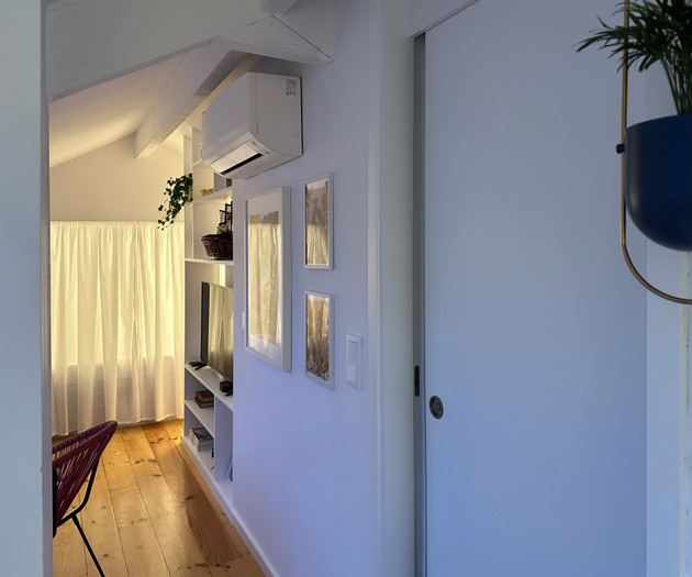 Hallway with framed art wall