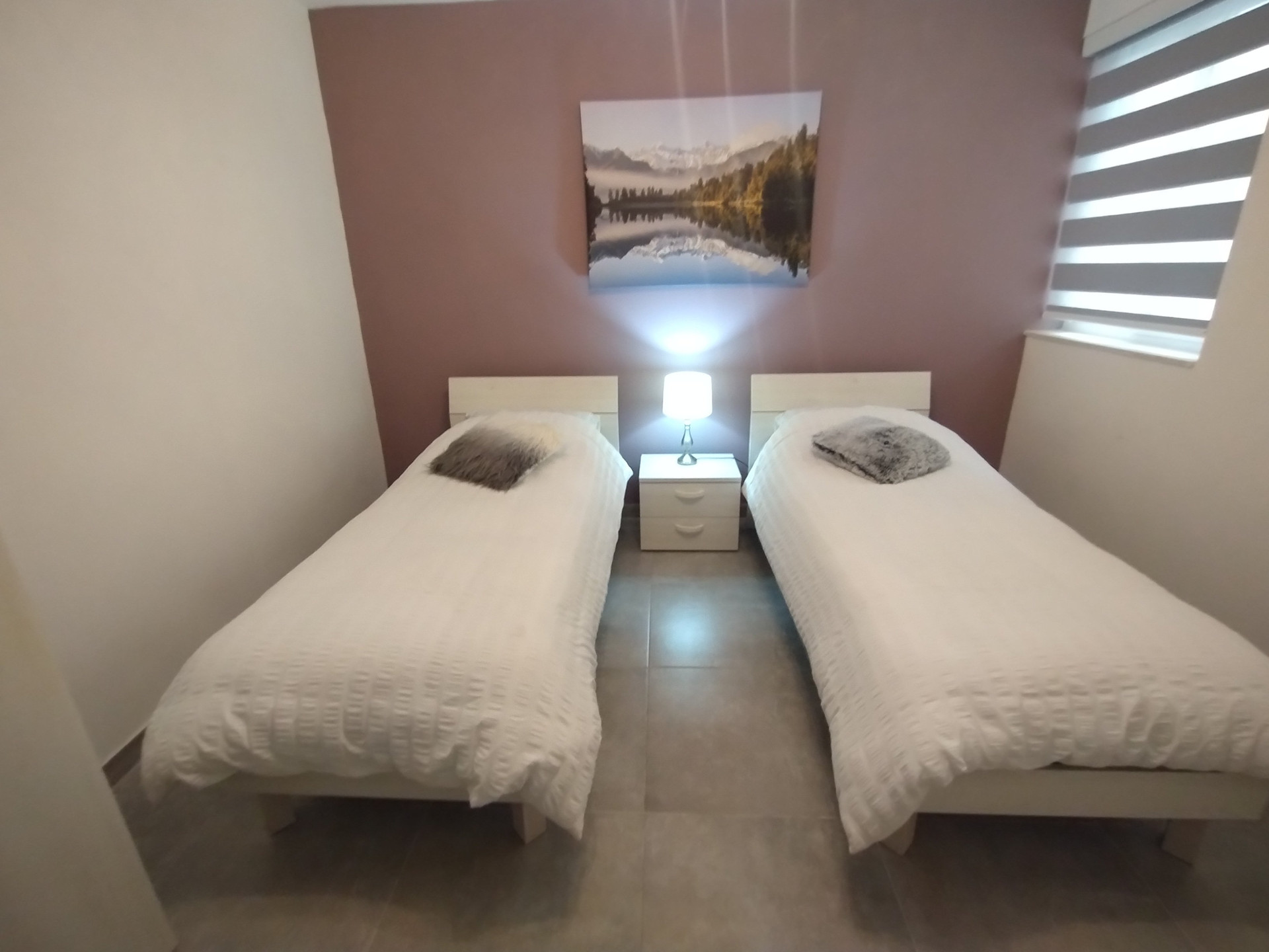 Twin bedroom with decorative wall art