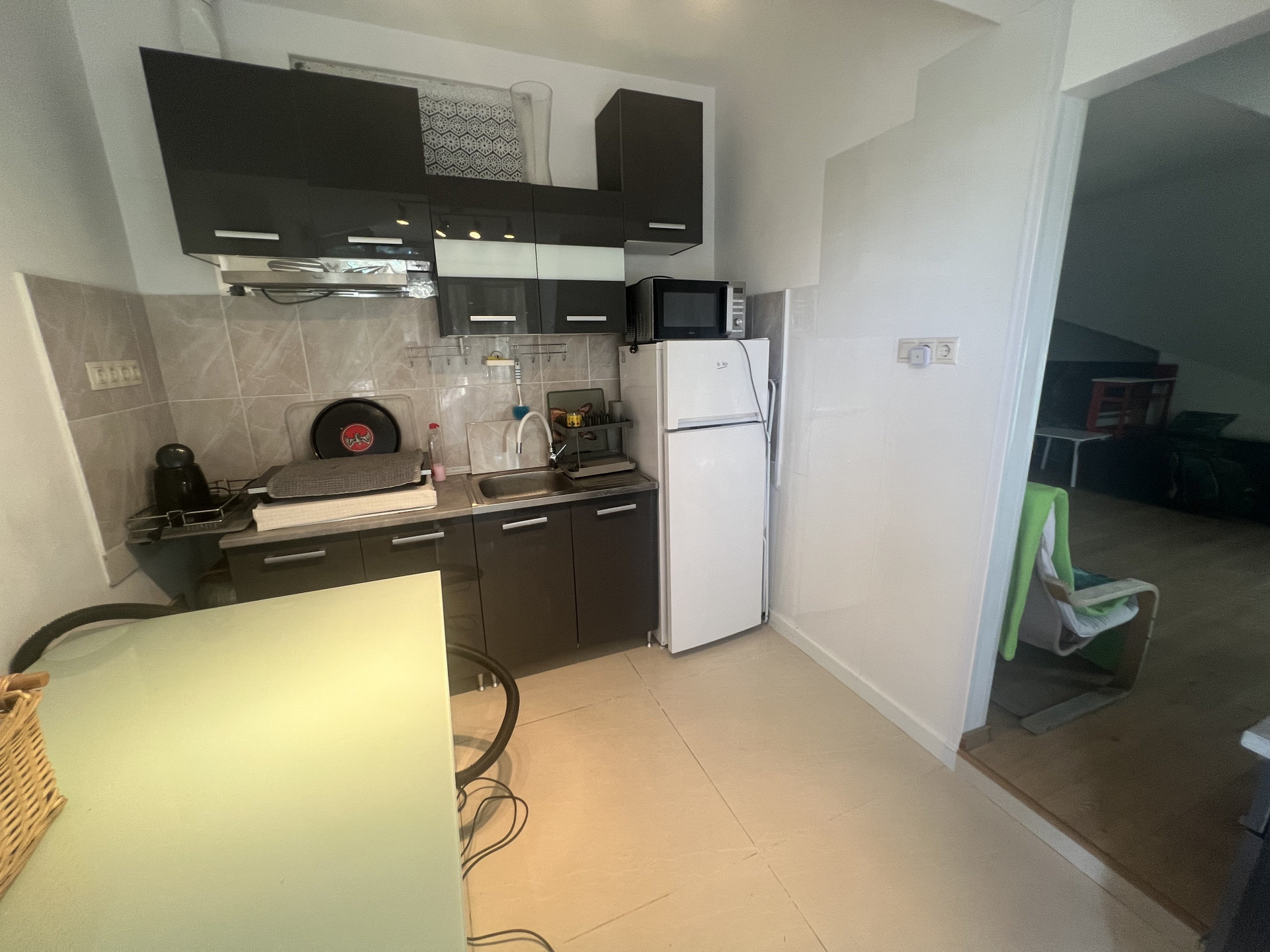 Kitchen with fridge and stove