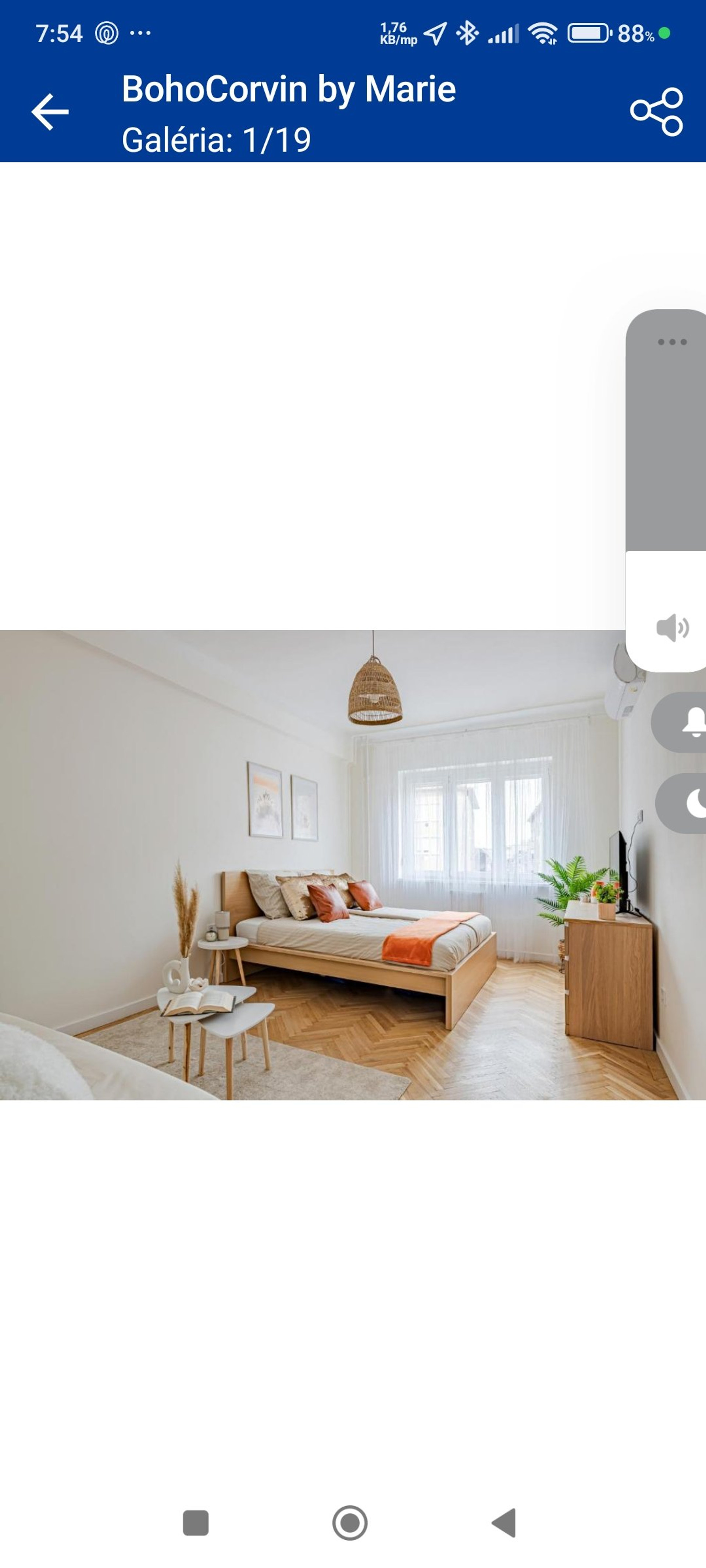 Bedroom with orange accent pillows