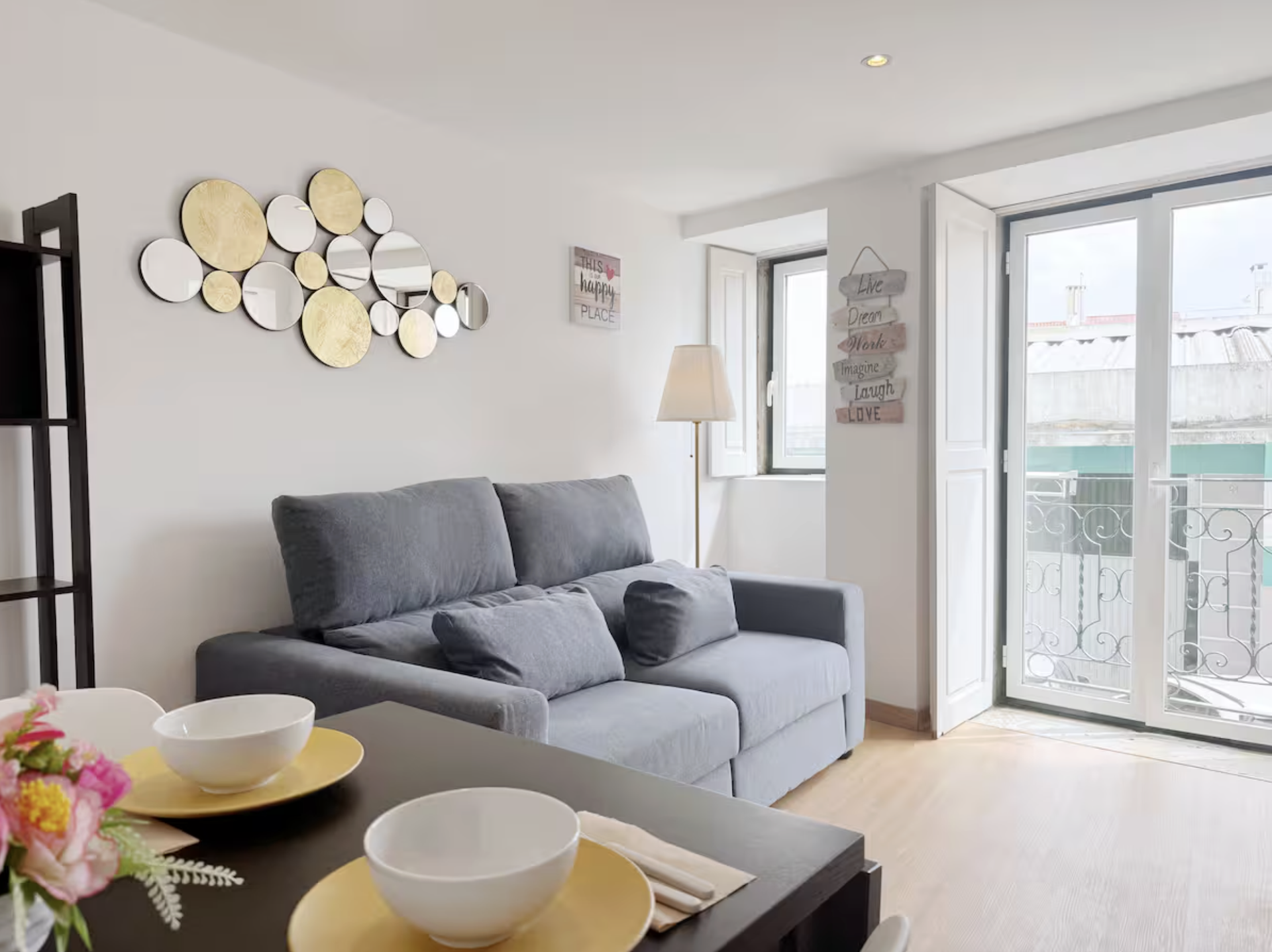 Bright living room with balcony access