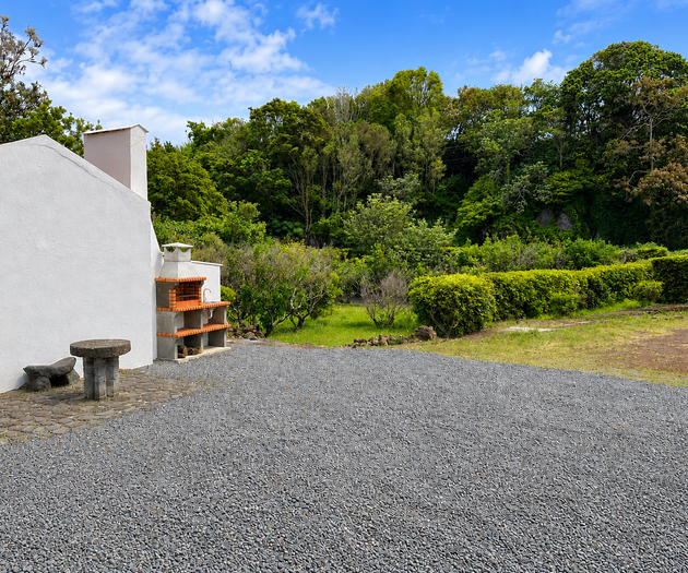 Gravel yard with barbecue area