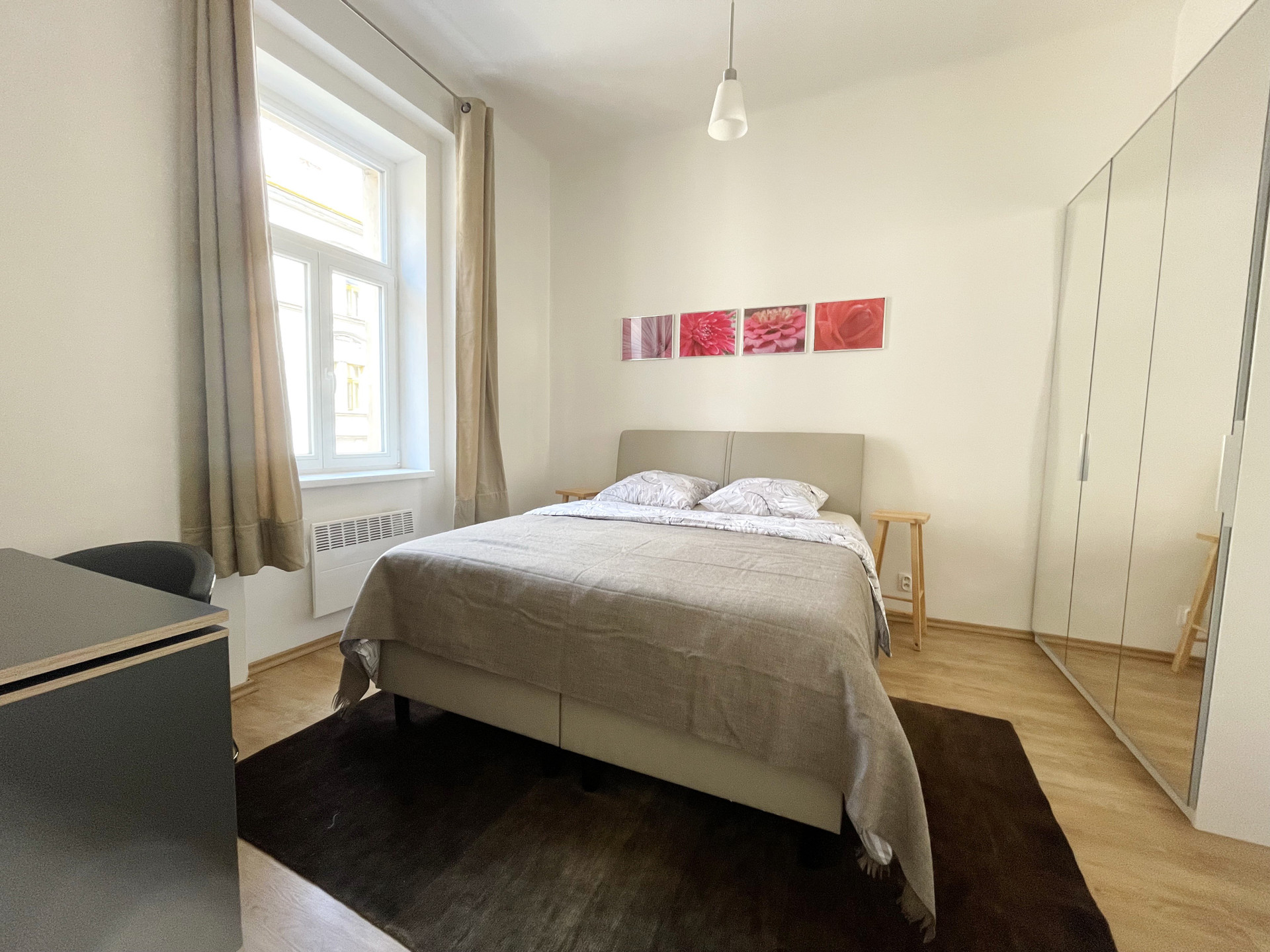 Bright bedroom with large window