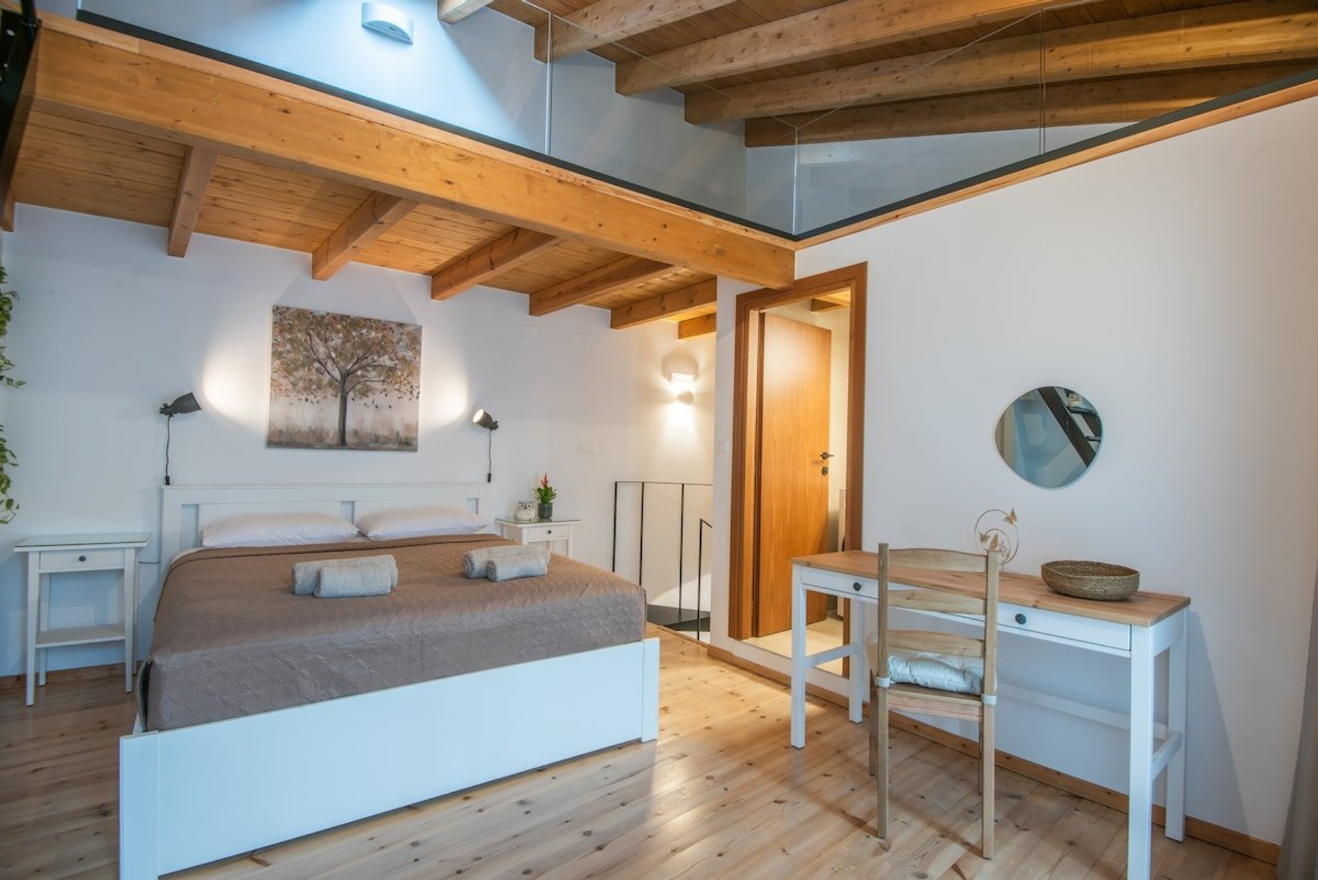 Bedroom with mezzanine and desk