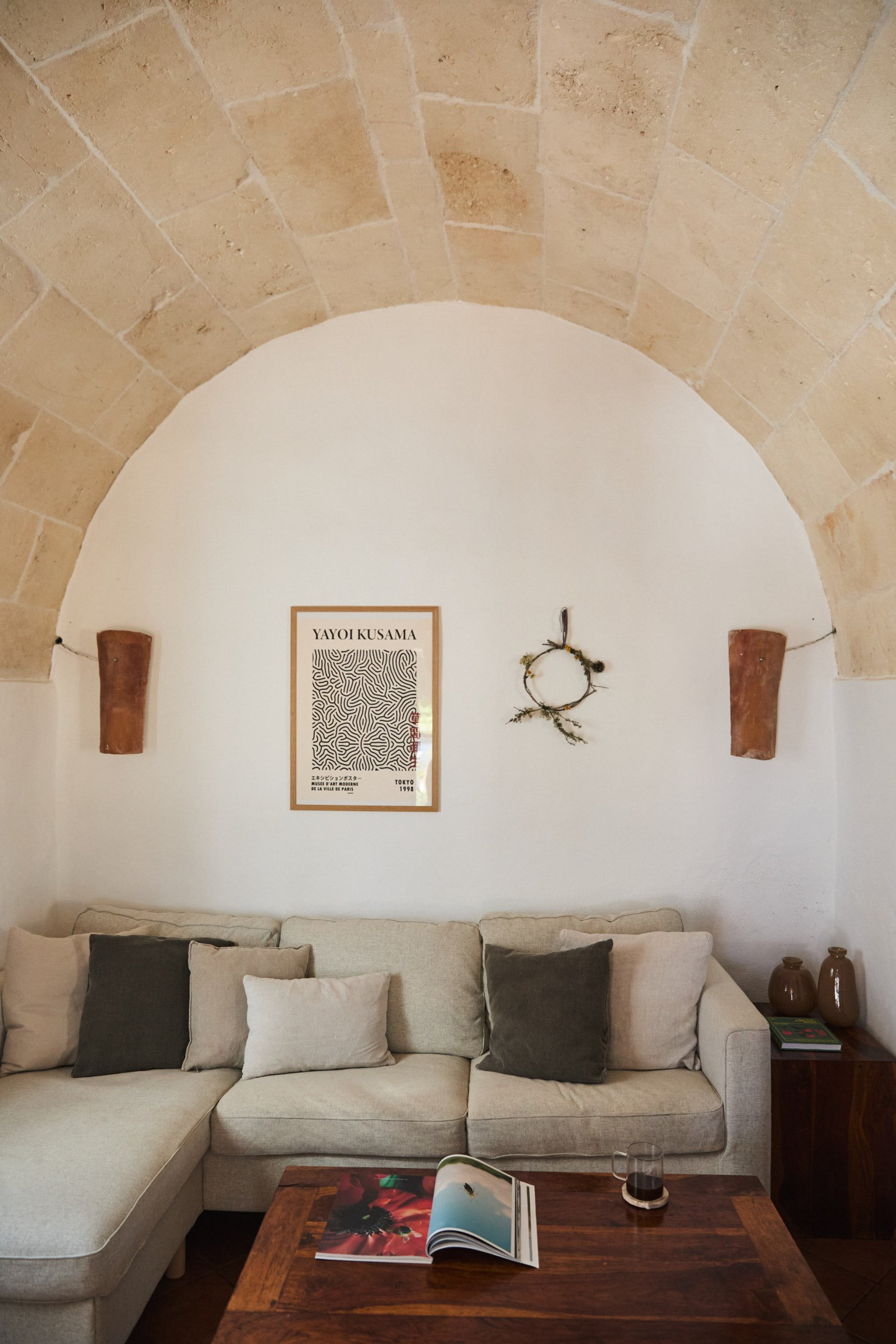 Living room stone arch vaulted ceiling