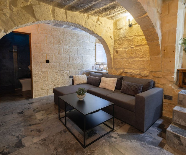 Living room with sofa and stairs