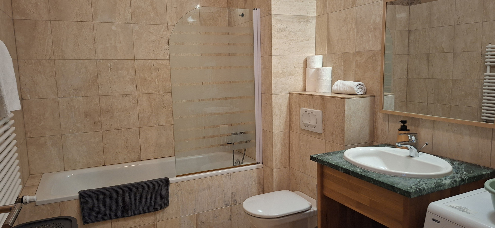 Bathroom with bathtub and sink