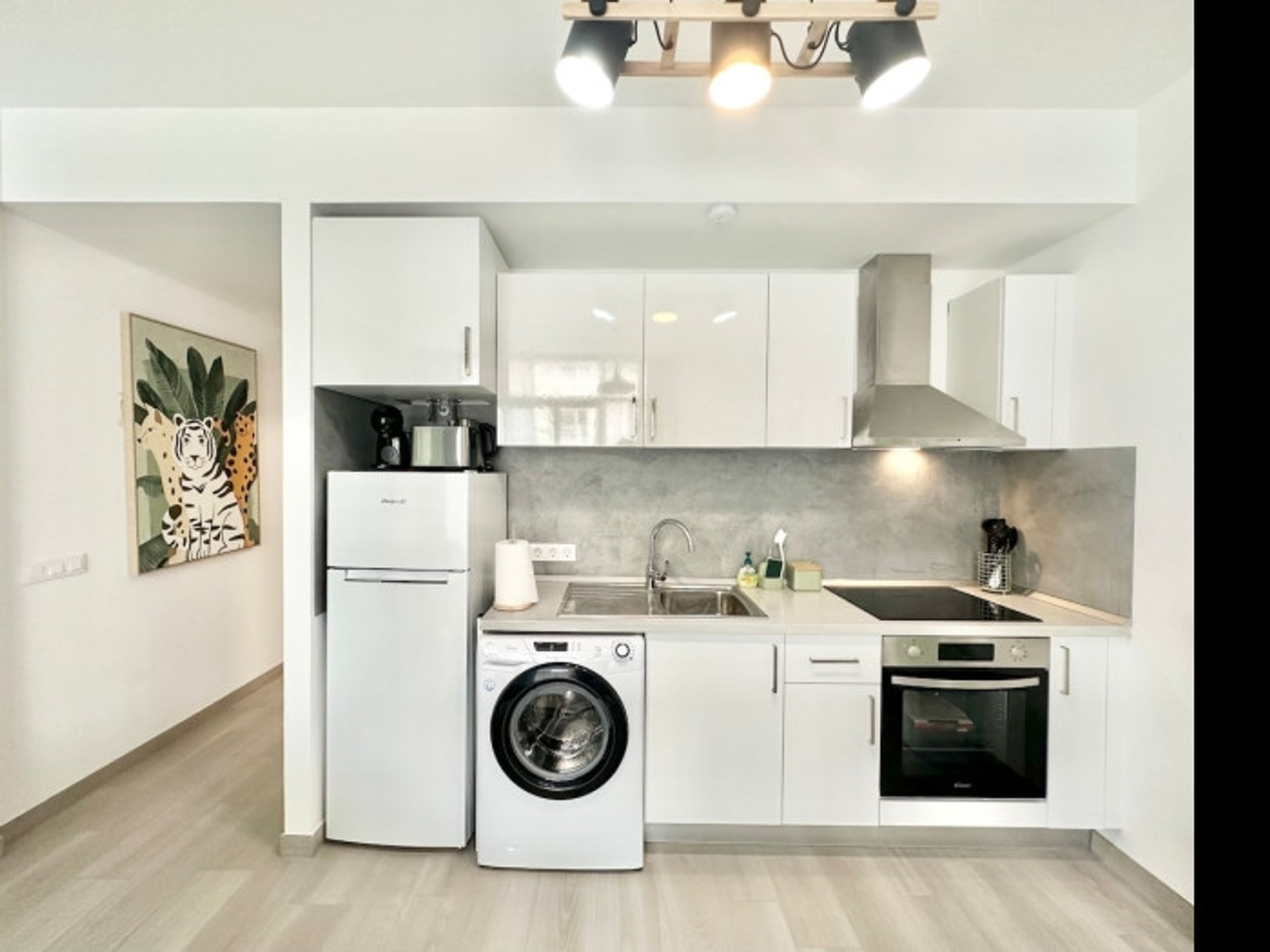White kitchen with washing machine