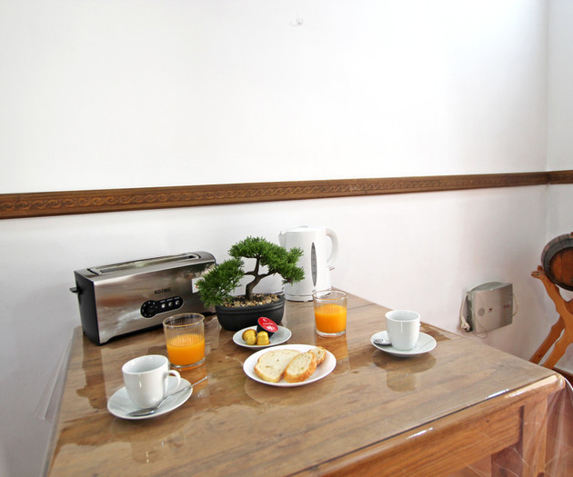 Breakfast table with wine barrel