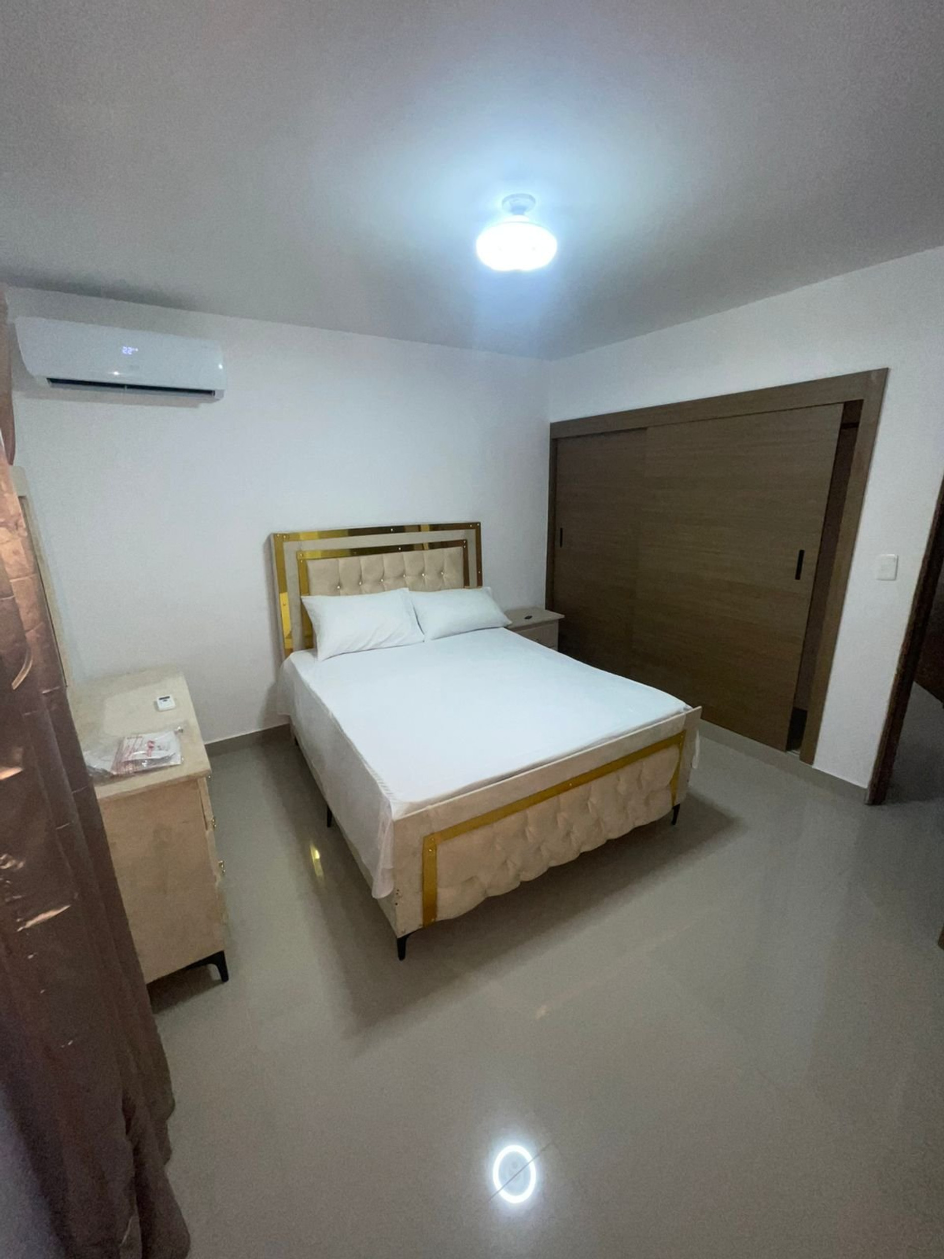 Bedroom with closet and AC
