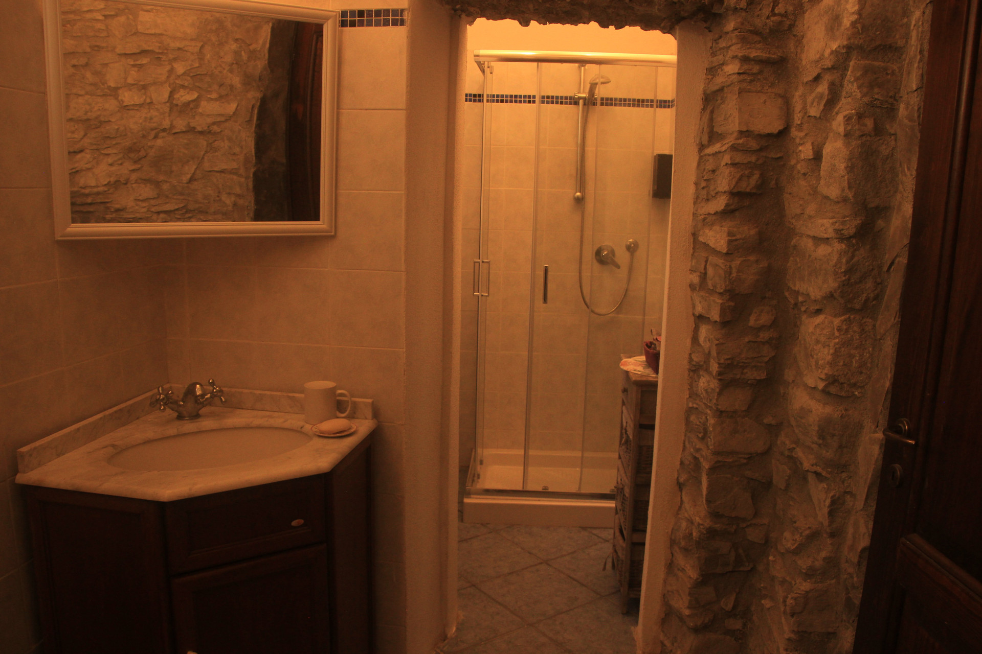 Bathroom with vanity and shower