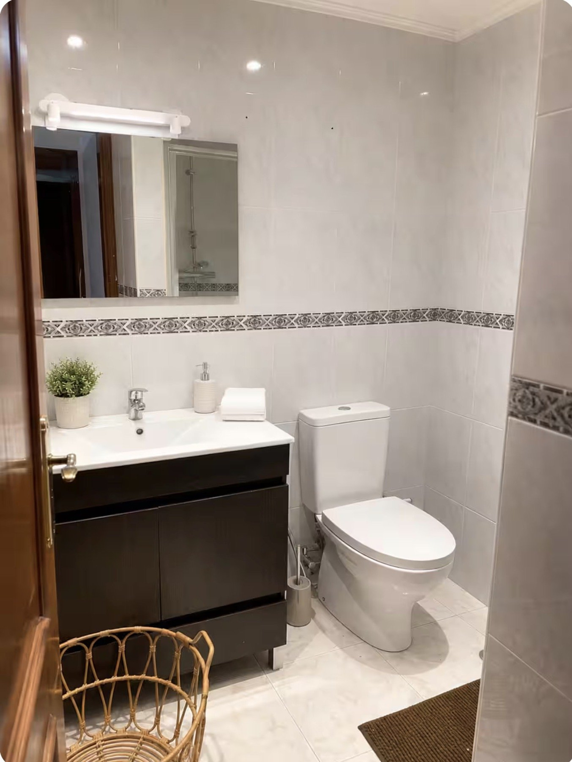 Bathroom with sink and toilet