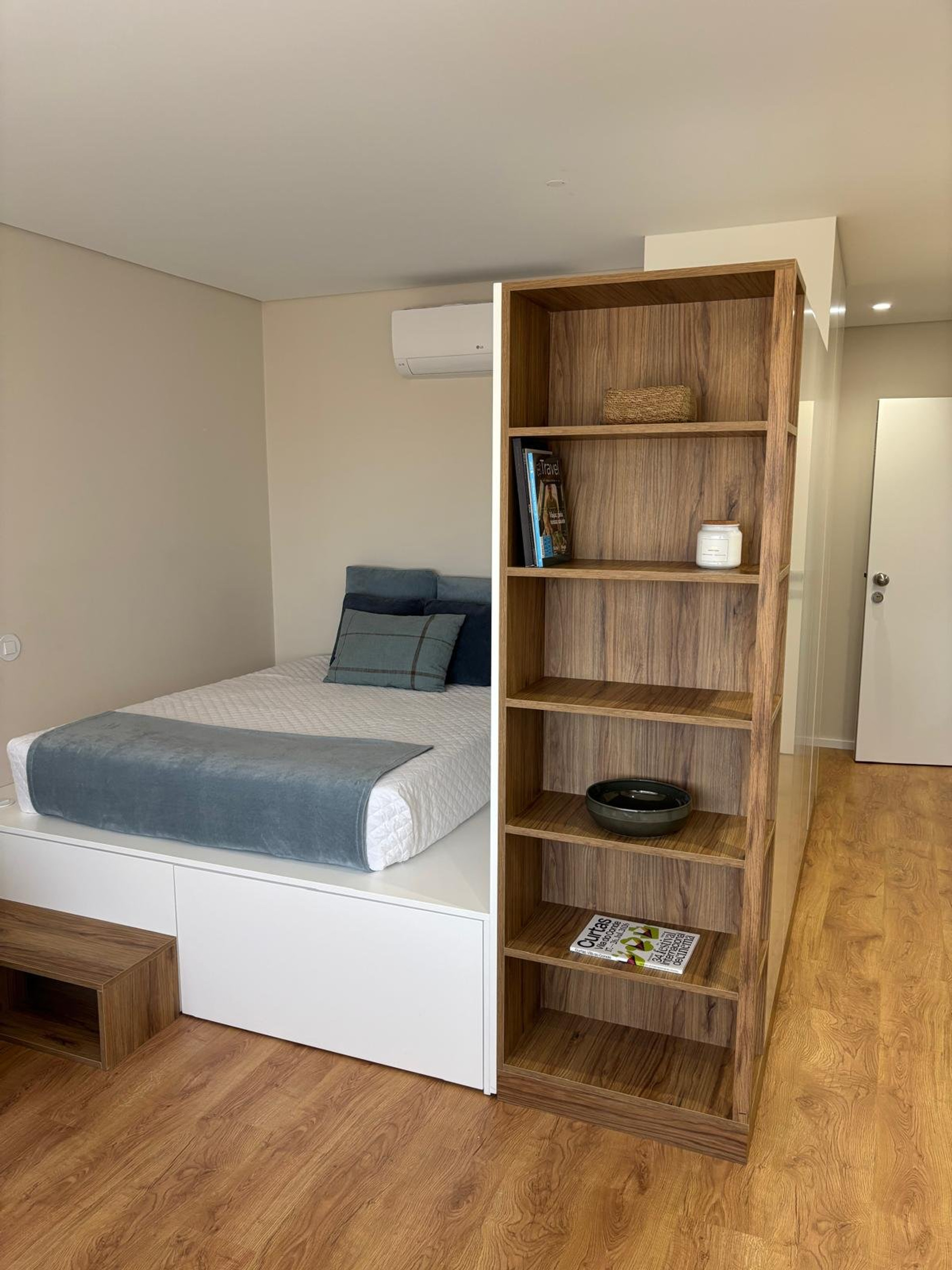 Bedroom with shelf divider