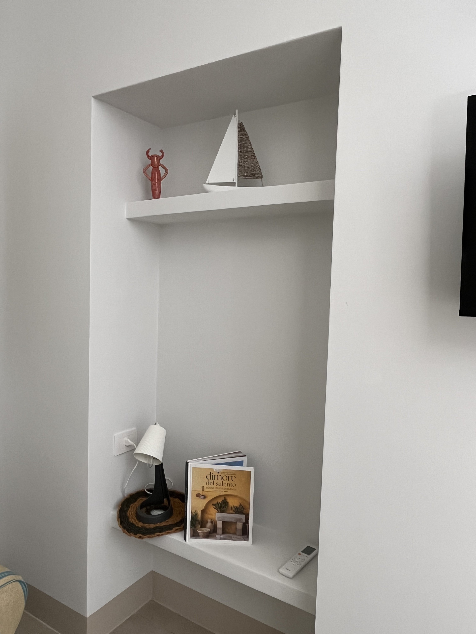 Built-in wall niche with decor