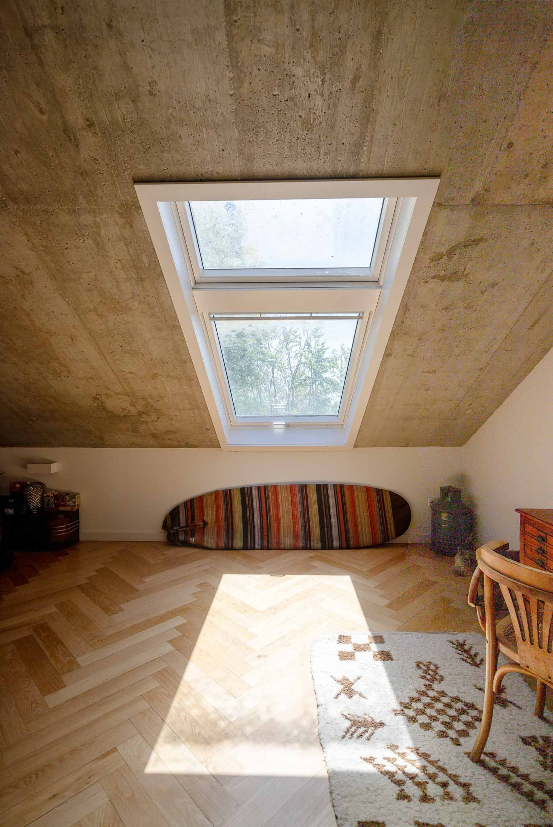 Attic room with skylight windows
