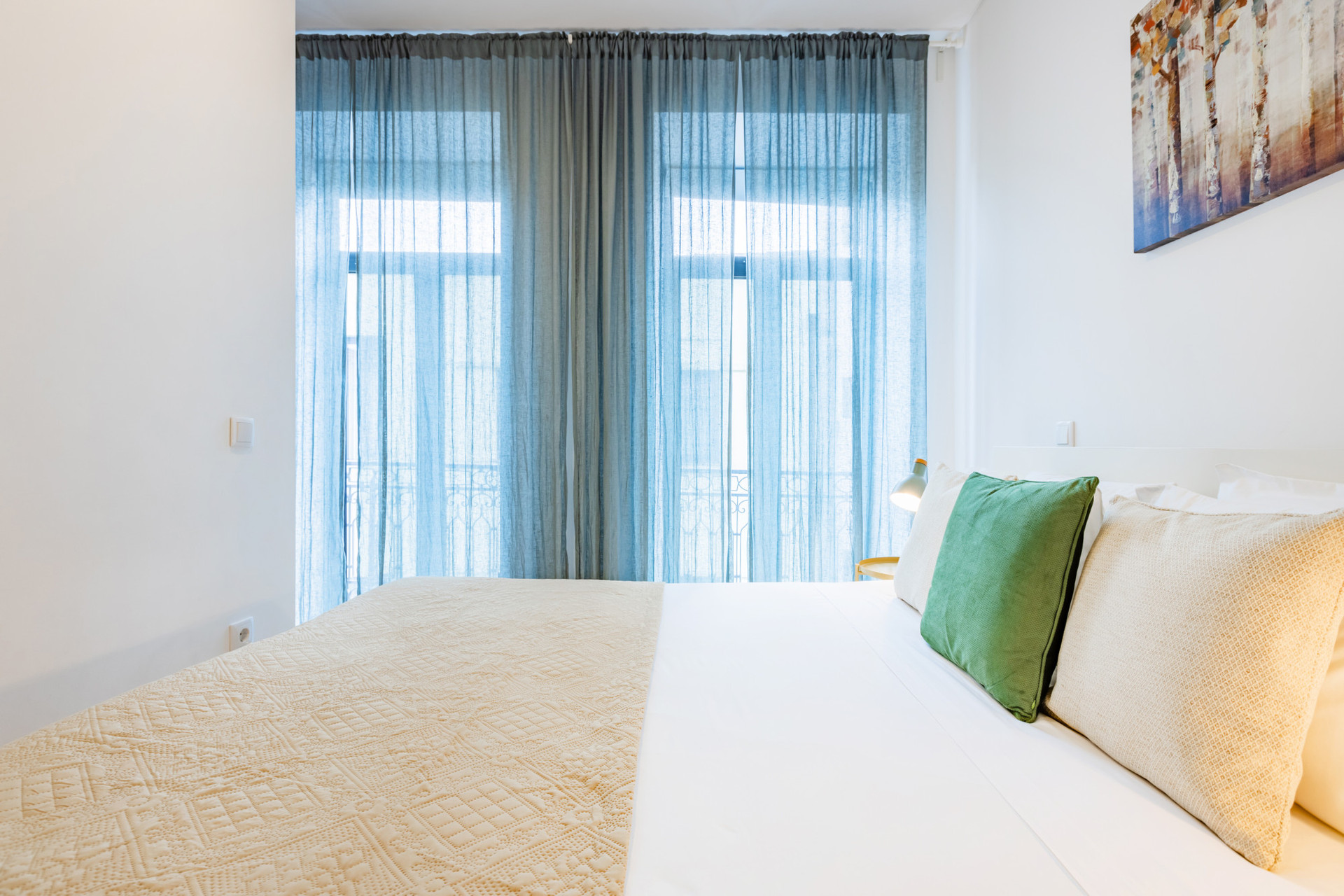 Bedroom with a queen sized bed (160cm x 200cm) and wardrobe.