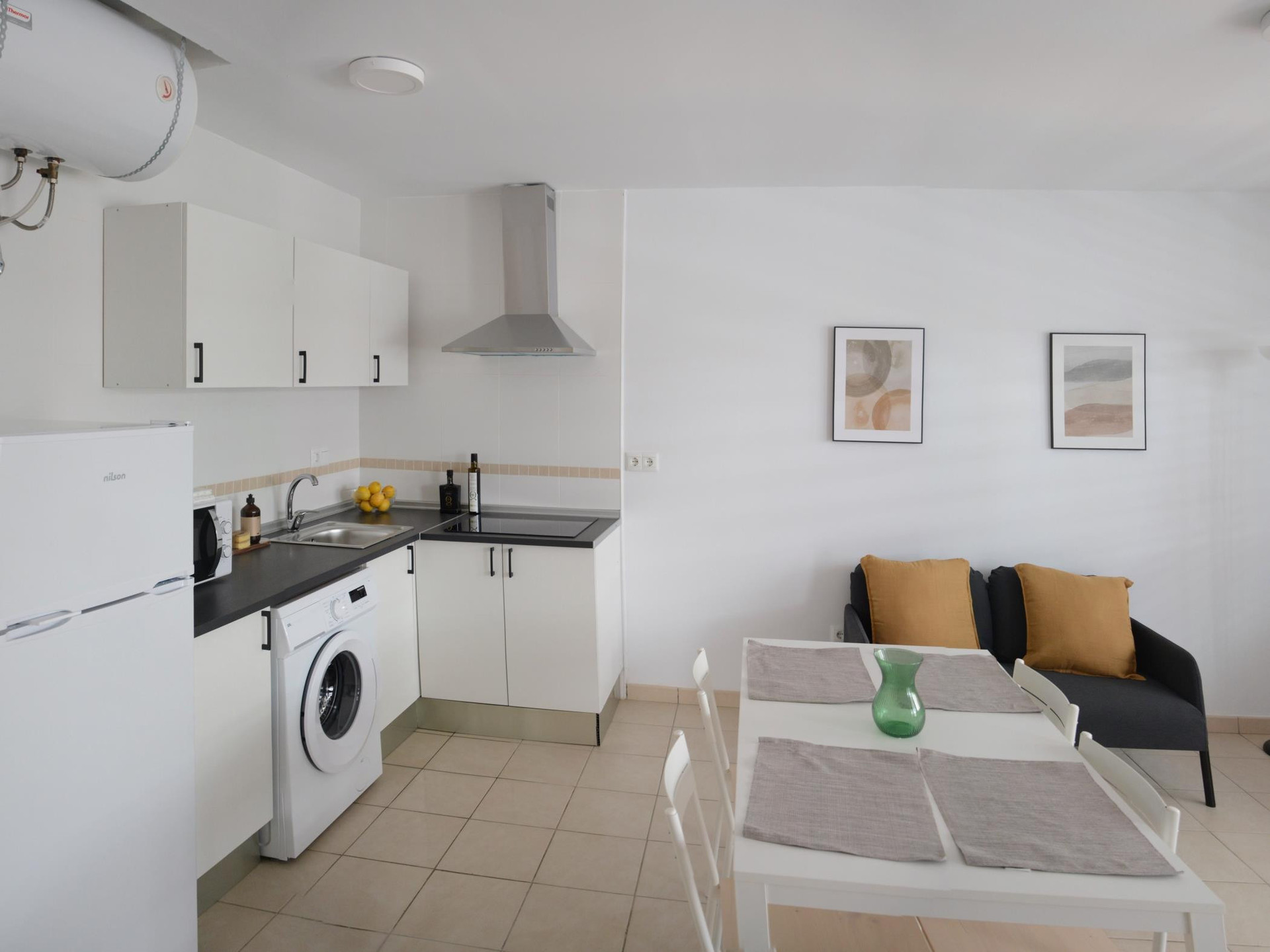 Kitchen with dining and sofa area