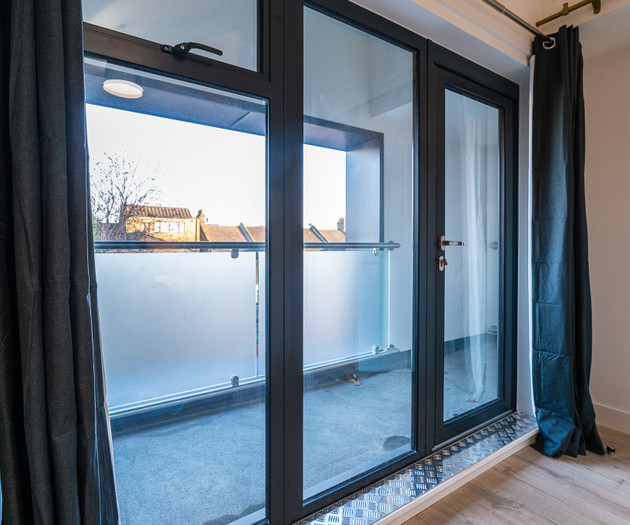 Balcony doors with curtains