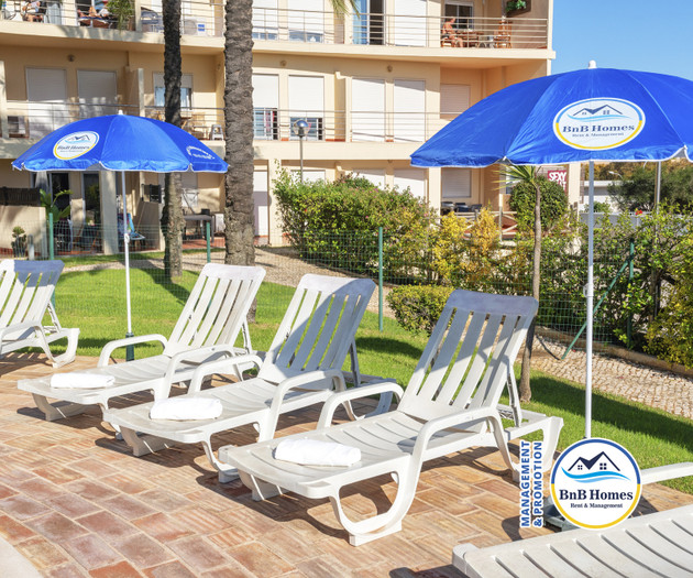 BnB Homes apartment with cozy Terrace & pool