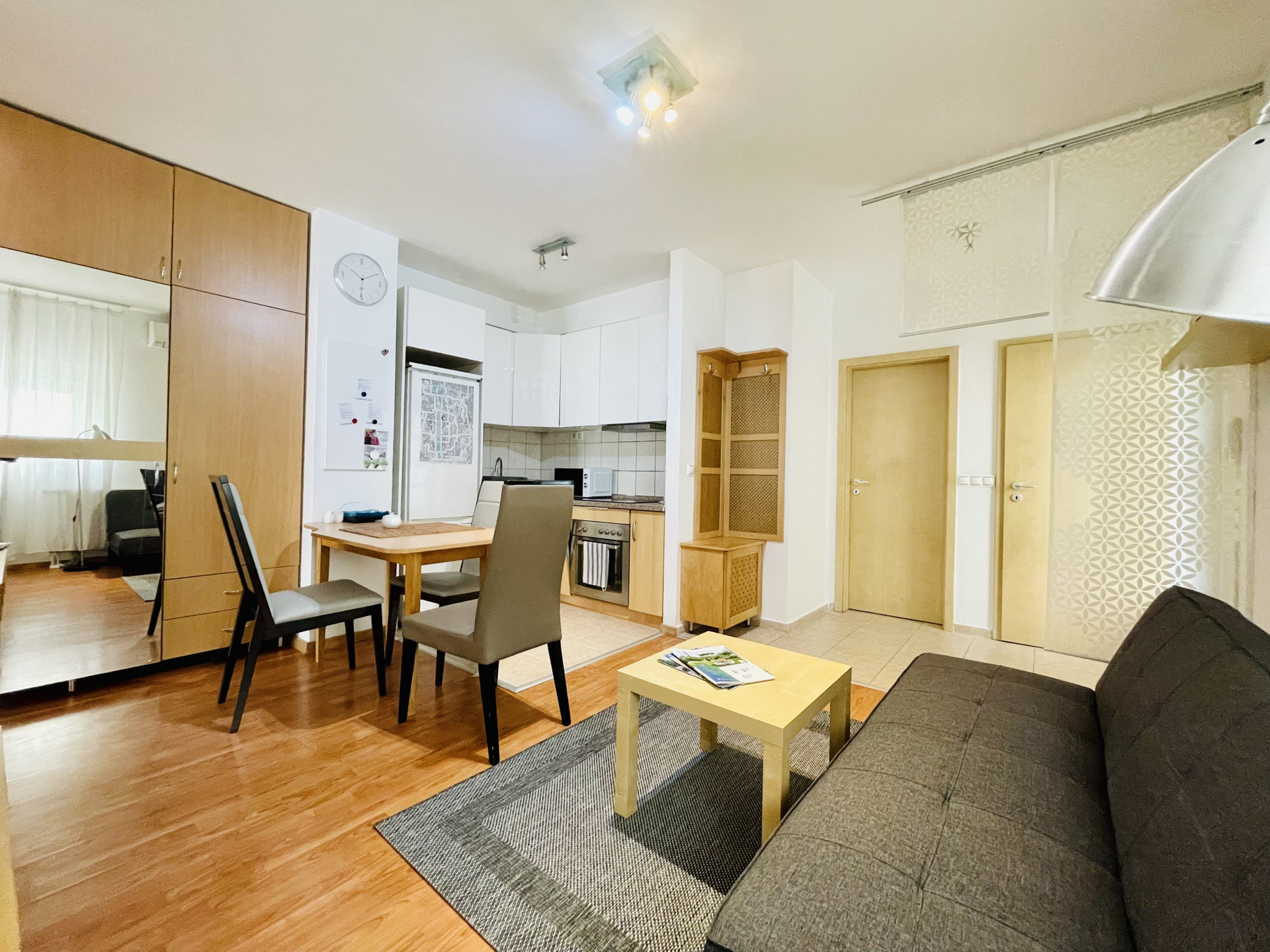 Living room with kitchen corner