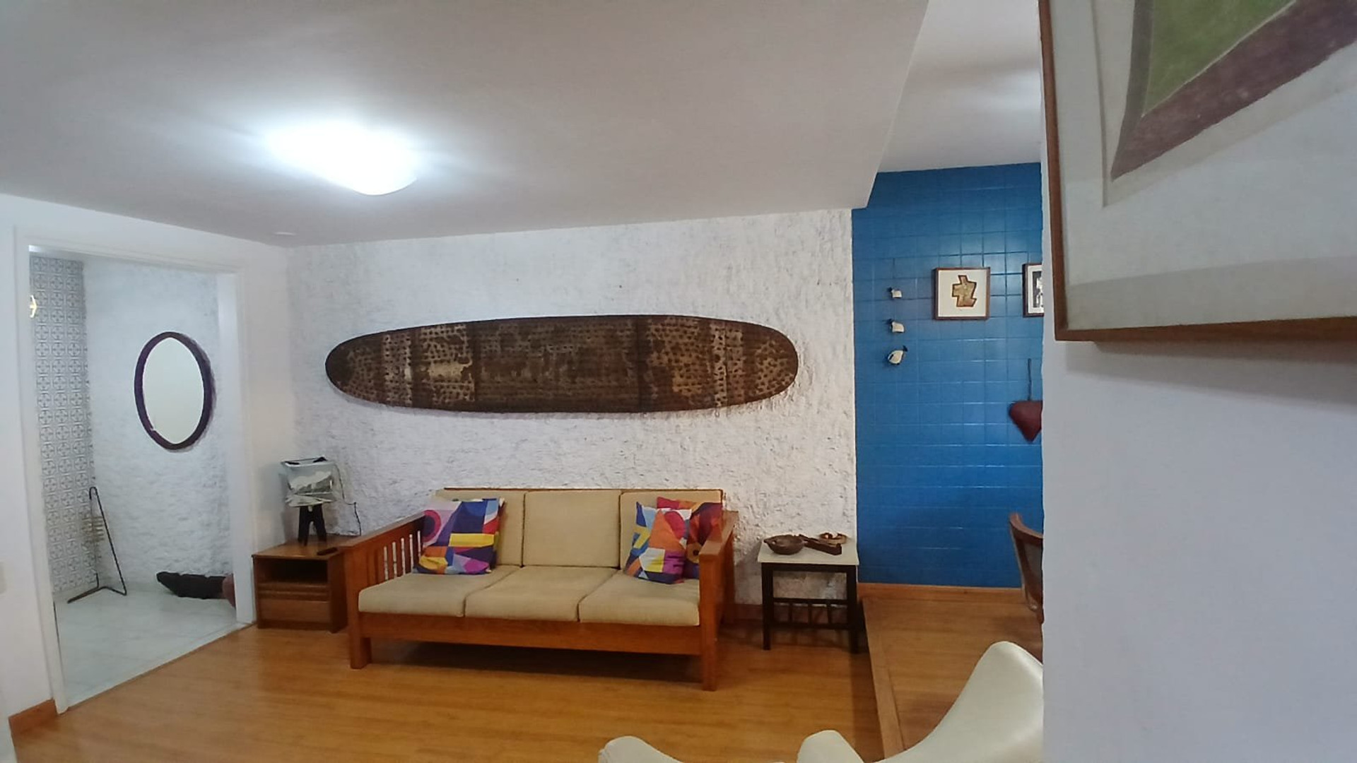 Living room with surfboard decor