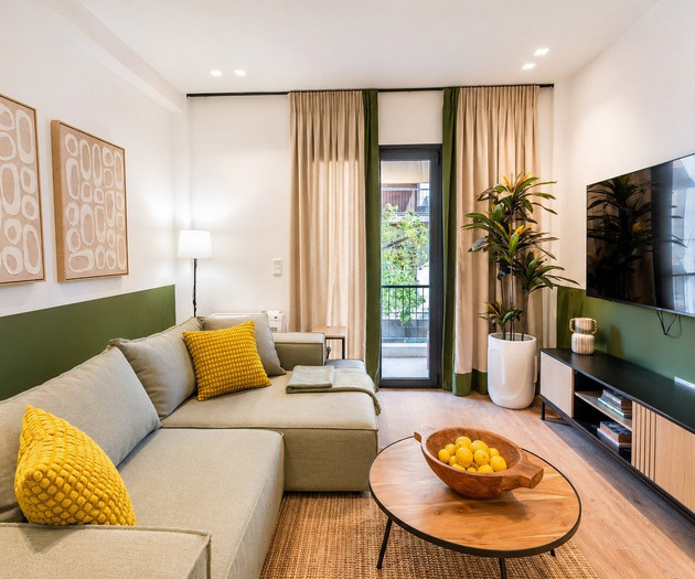 Living room with TV and balcony