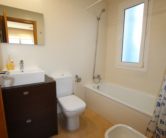 Bathroom with tub and sink