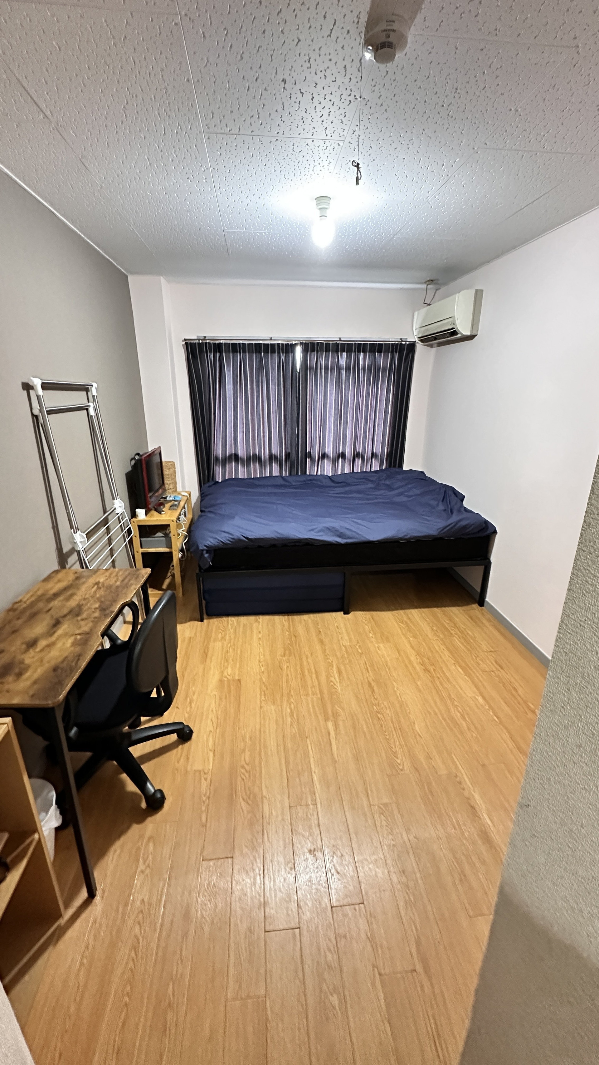Bedroom with bed and desk