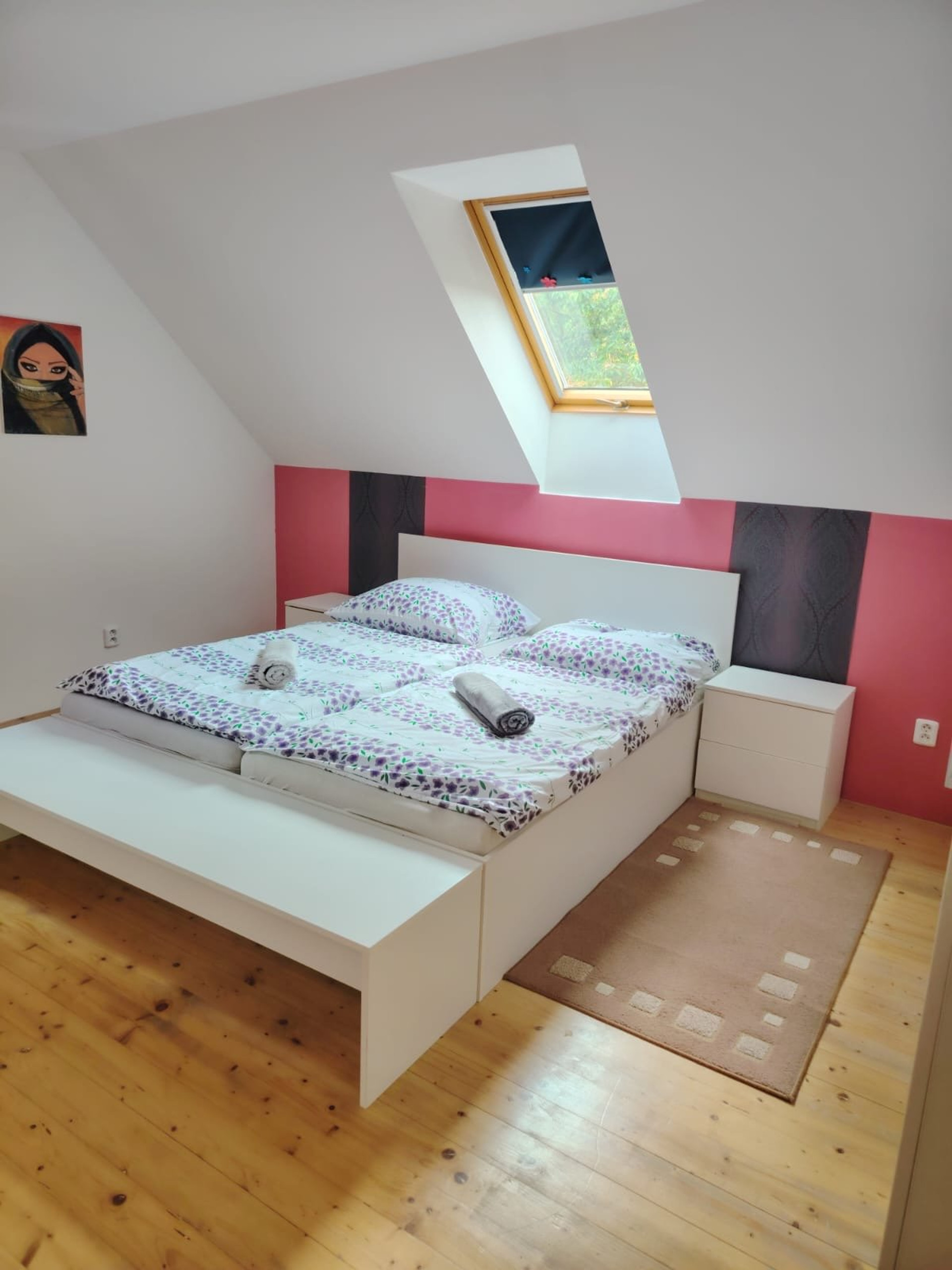 Bright double bedroom with skylight