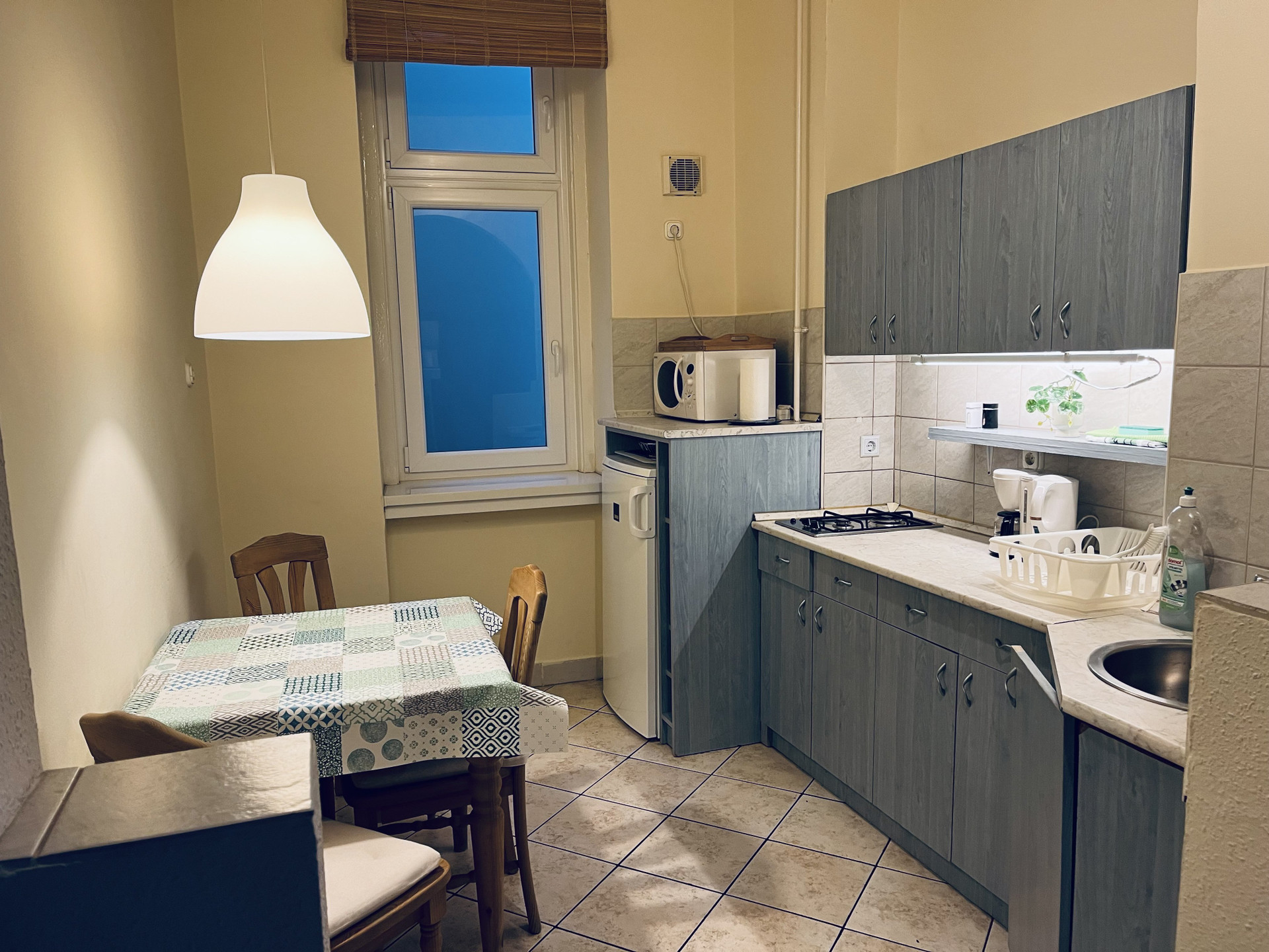 Compact kitchen with dining table