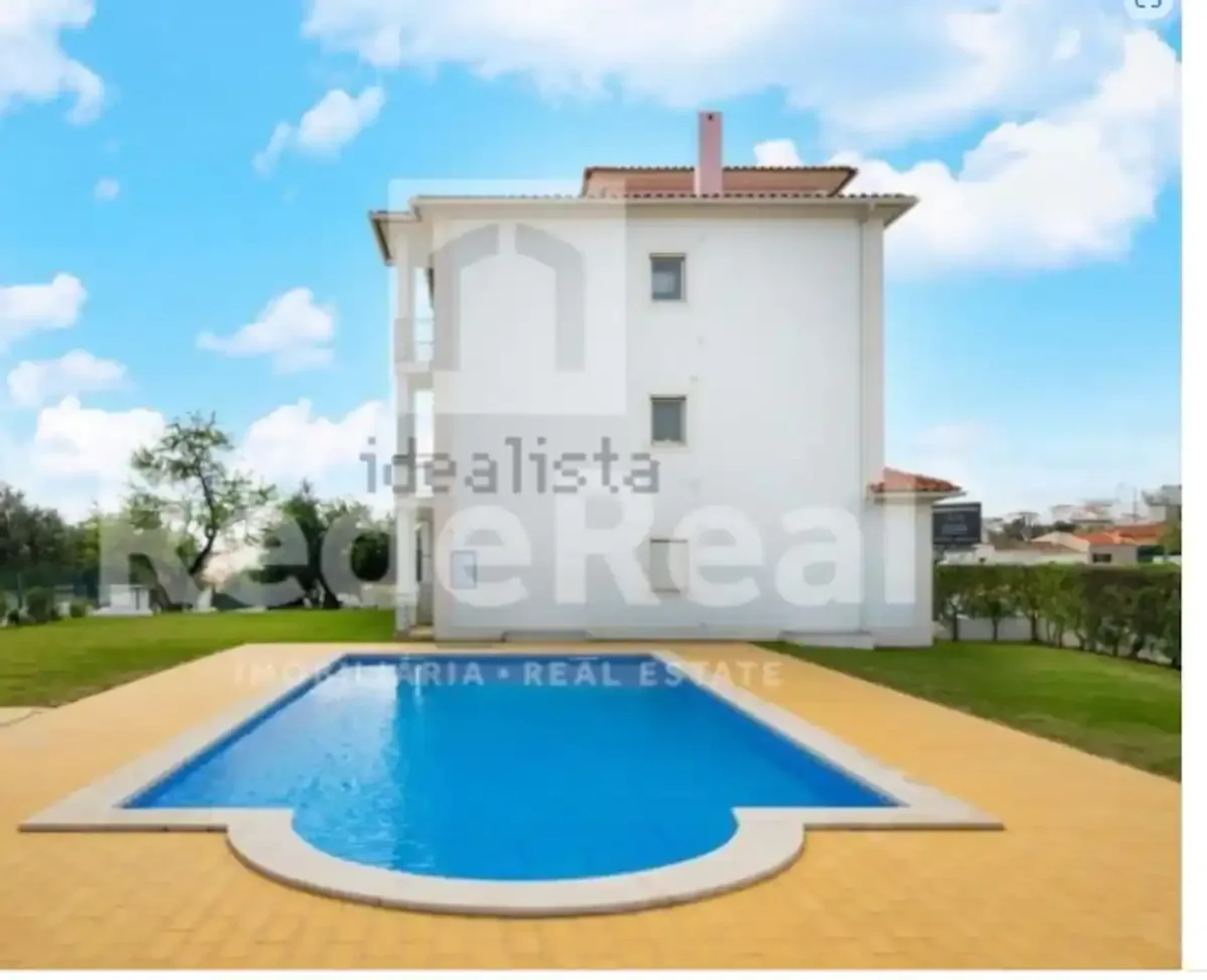 Building exterior with swimming pool