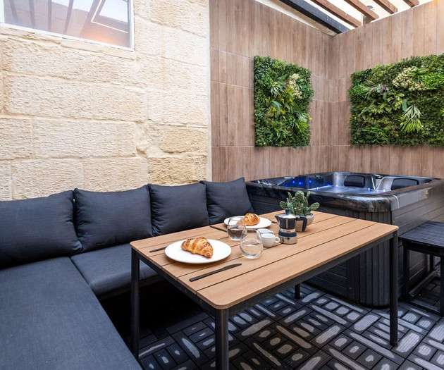 Outdoor seating near hot tub