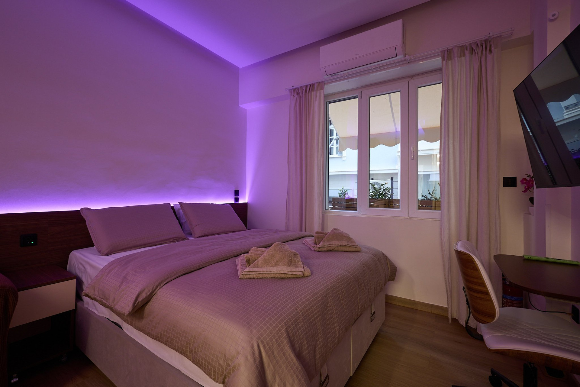 Bedroom with purple LED ambiance