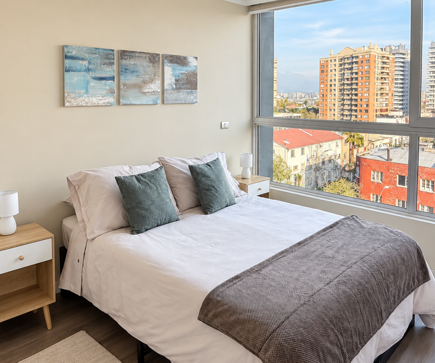 Bedroom with city skyline view