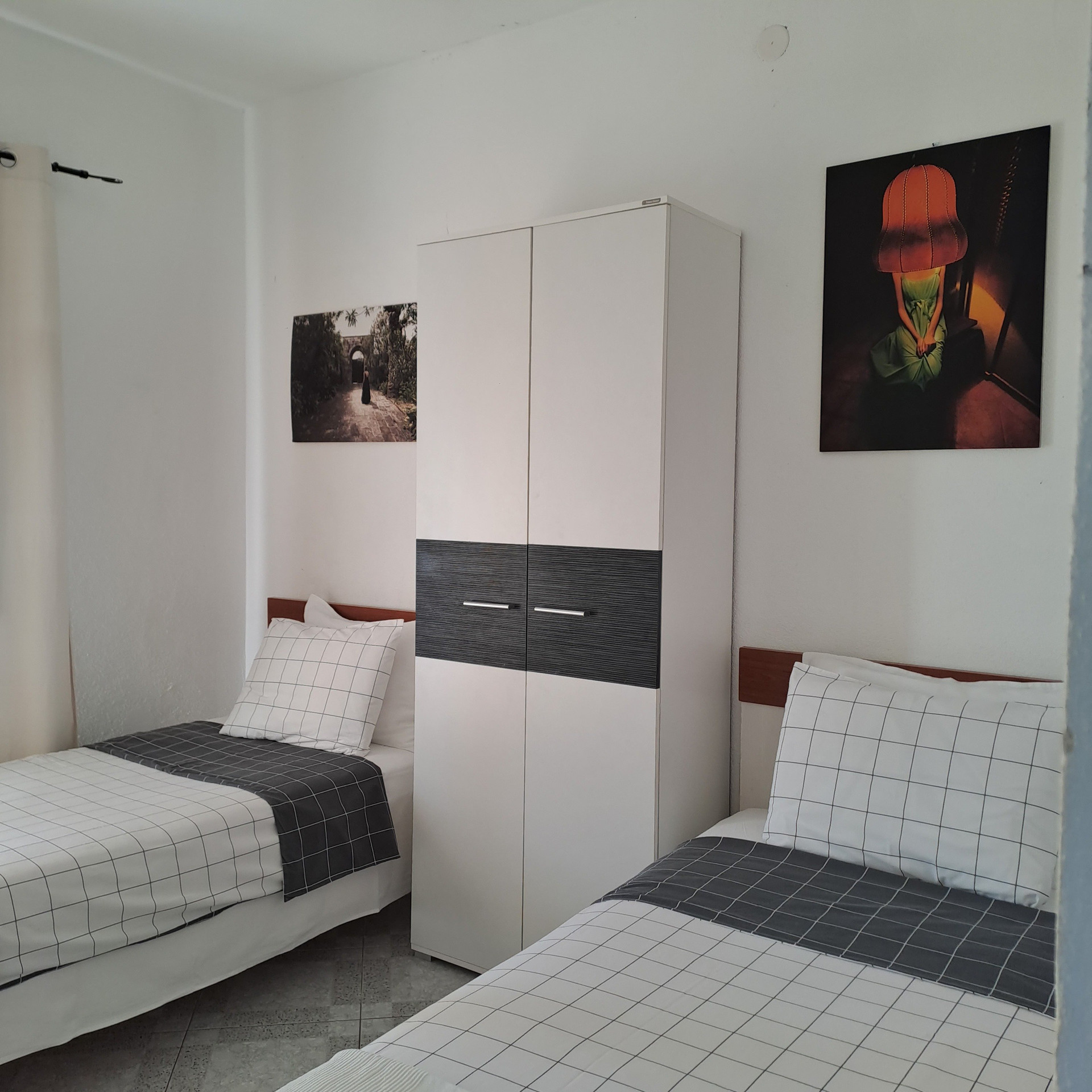 Twin bedroom with wardrobe