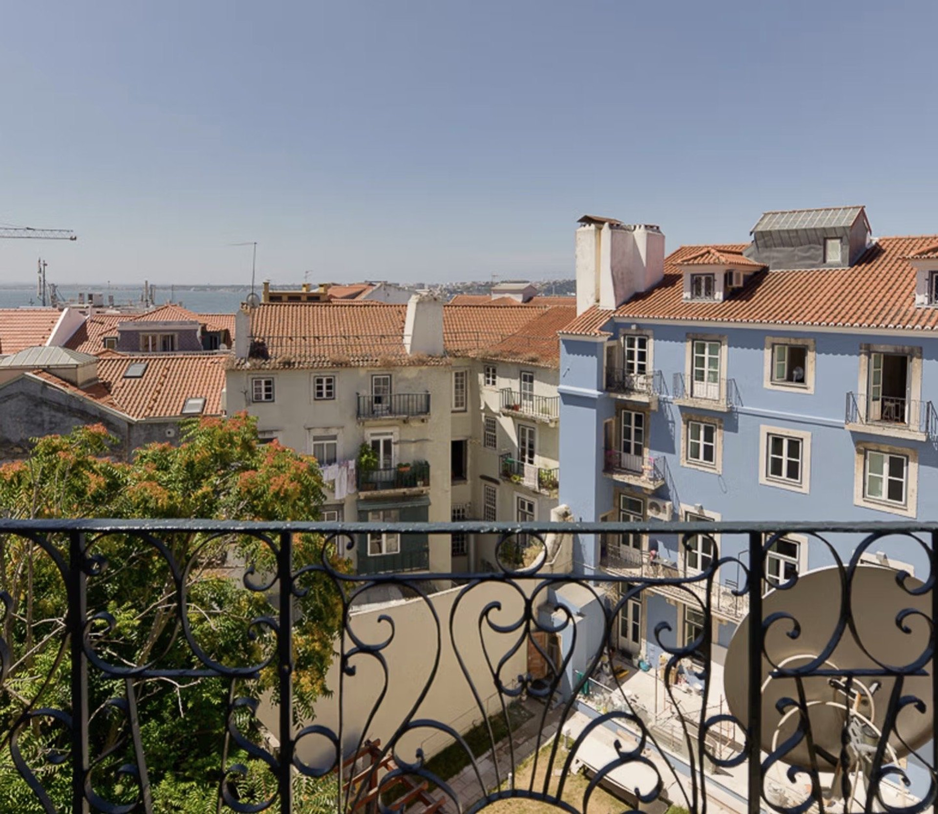 Balcony view over Lisbon rooftops