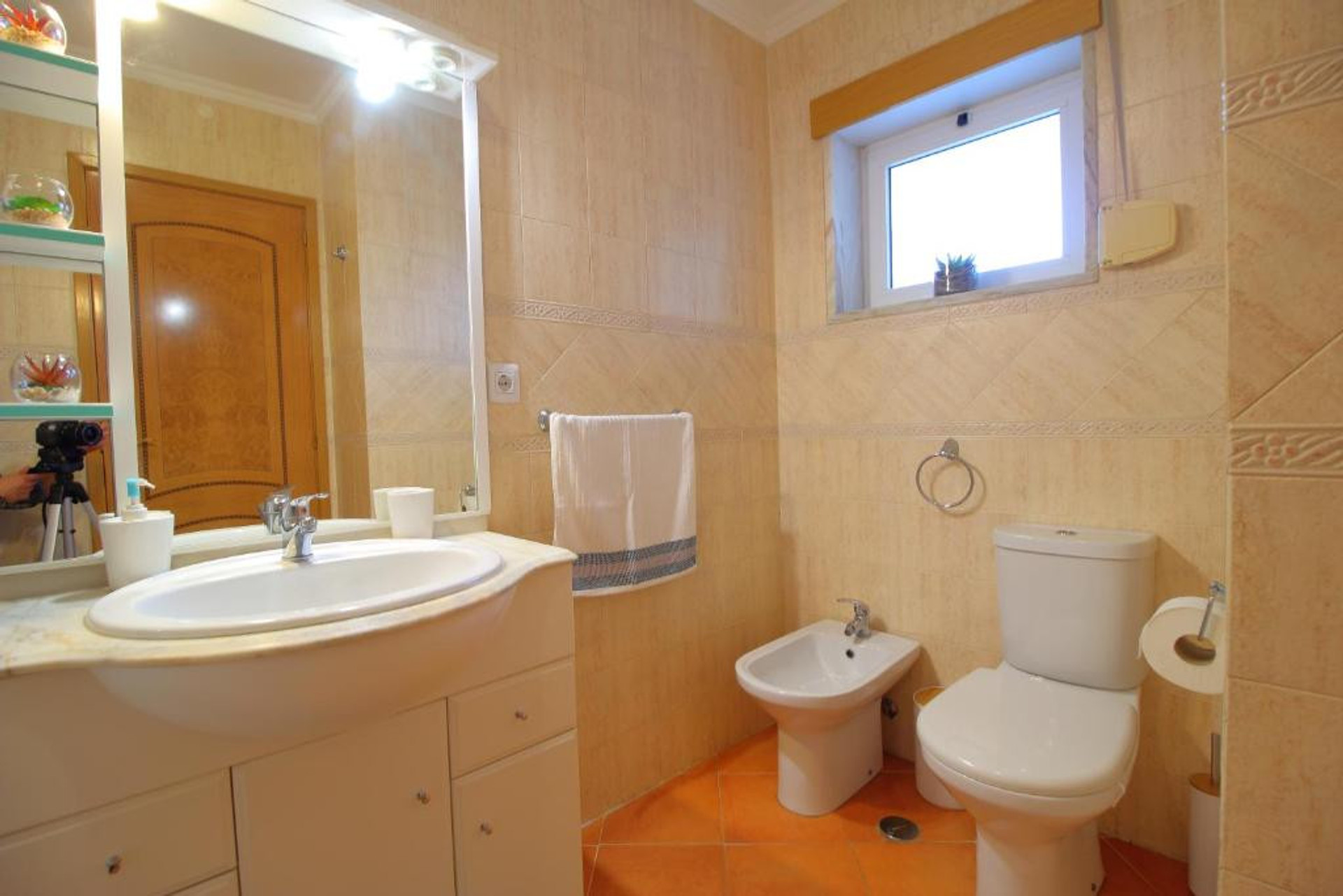 Bathroom with sink and toilet