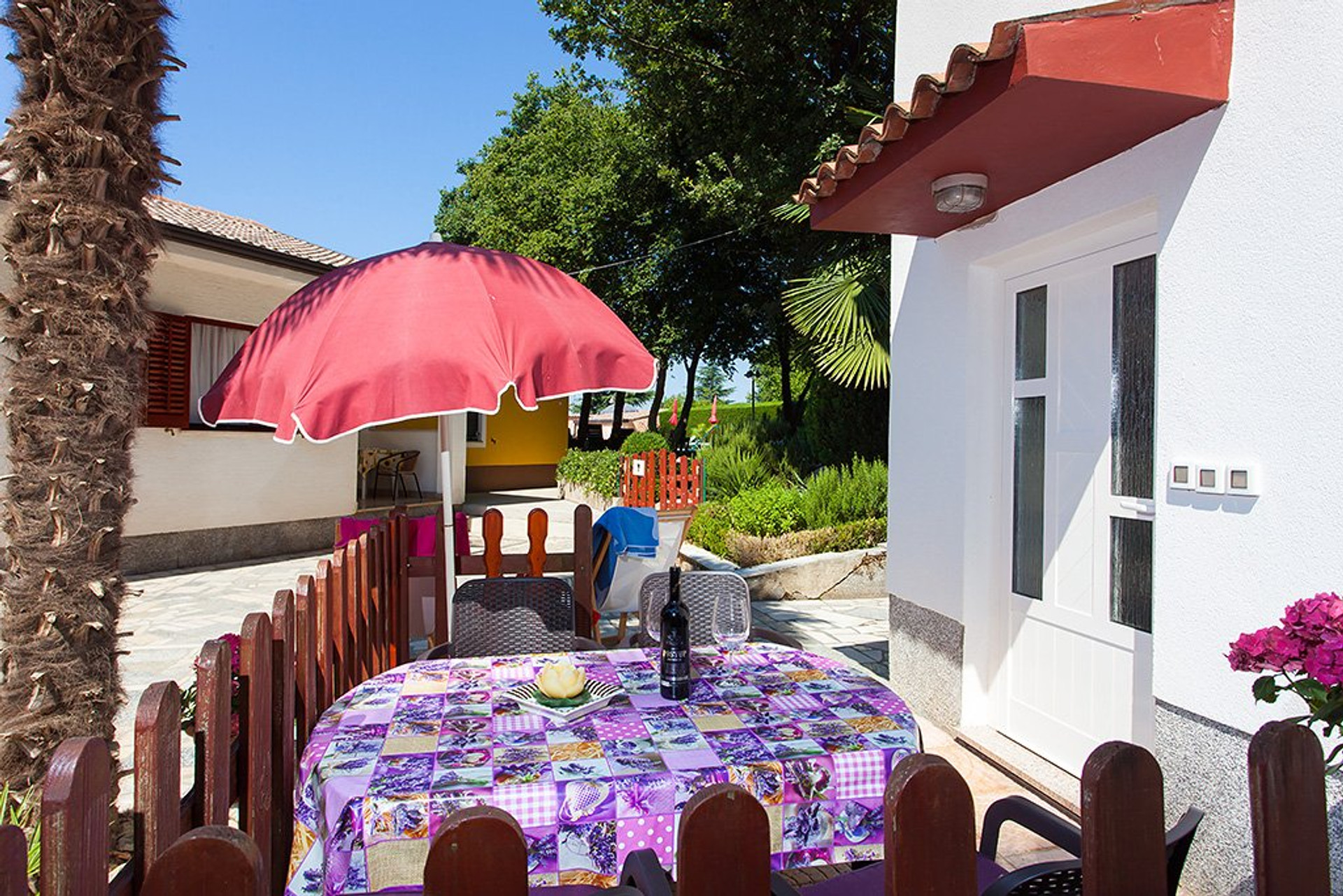 Outdoor dining table with umbrella