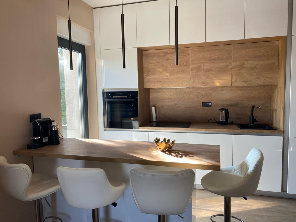 Modern apartment surrounded by greenery. preview