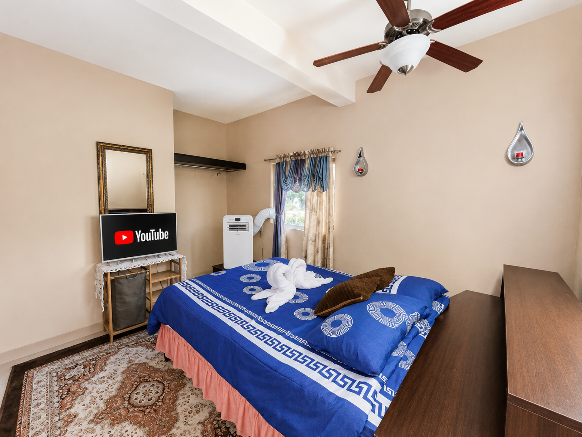 Bright bedroom with ceiling fan