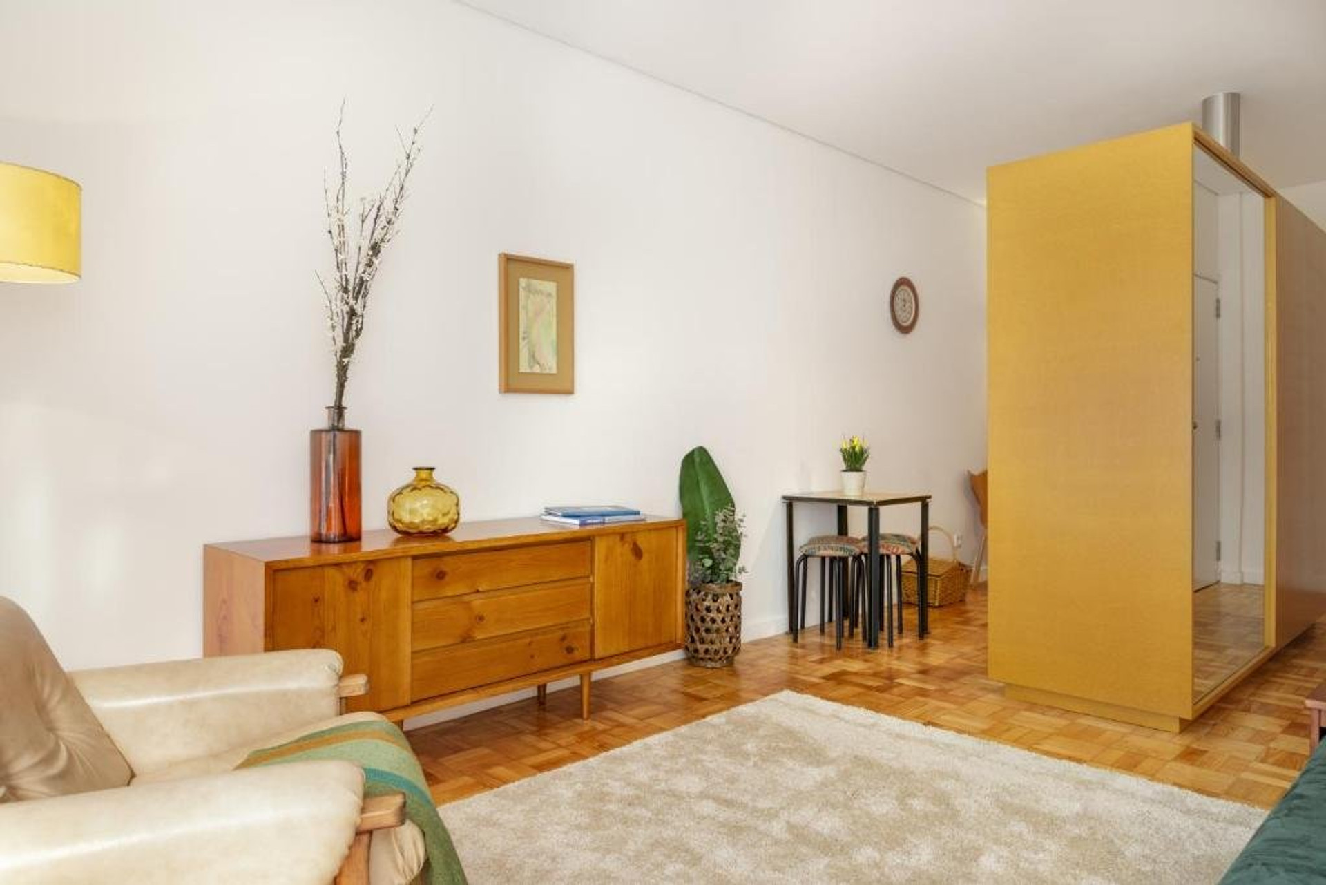 Living room with armchair and sideboard