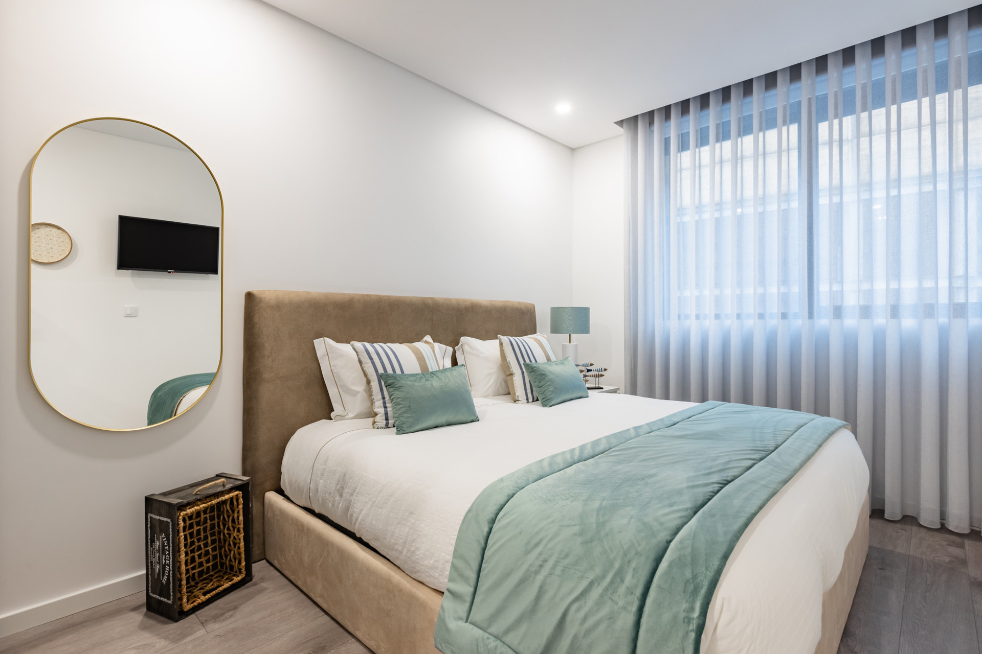 A comfortable double bed and TV.