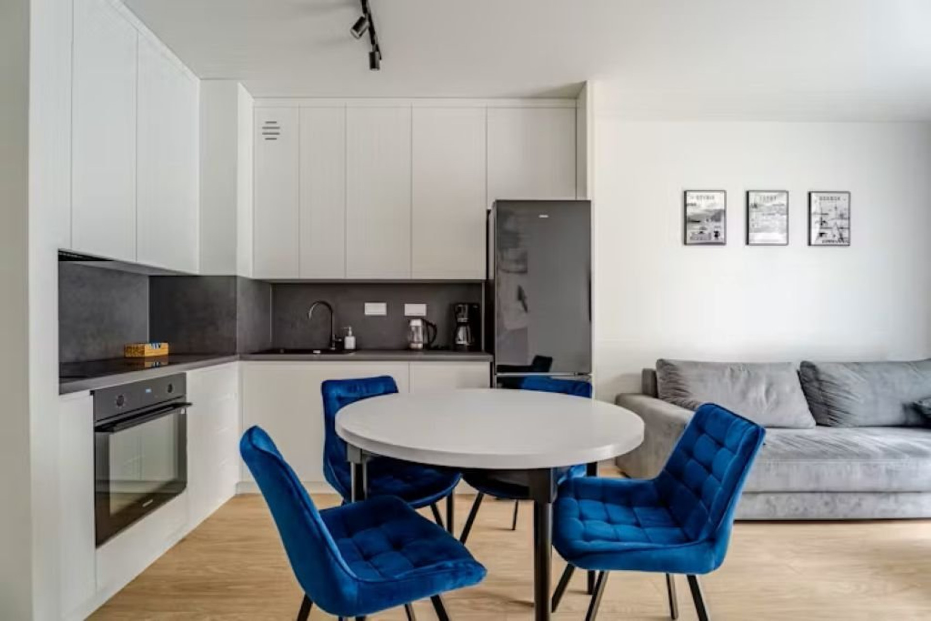 Kitchen, dining table and sofa